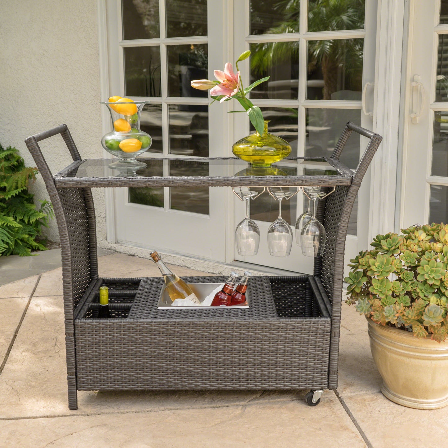 Brown wicker patio bar cart with glass top and wine cooler