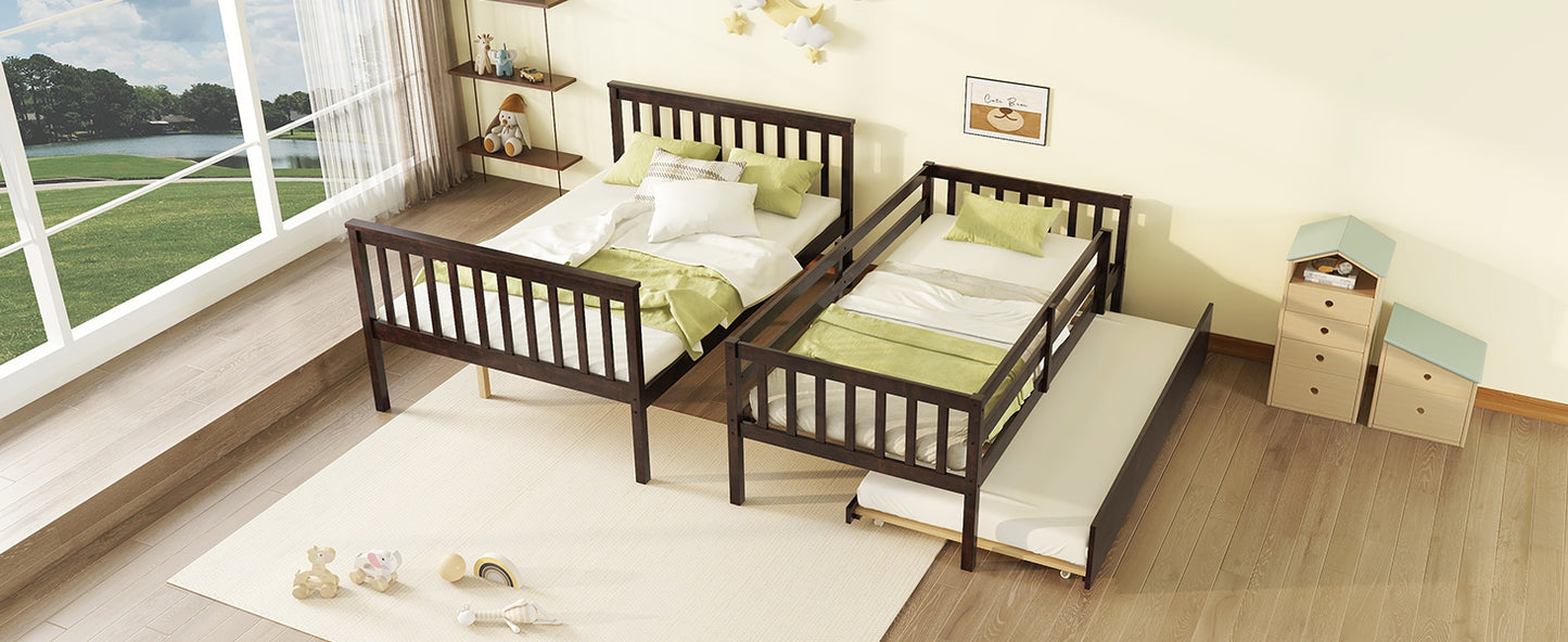 Dark wood twin bed with pullout trundle and green bedding