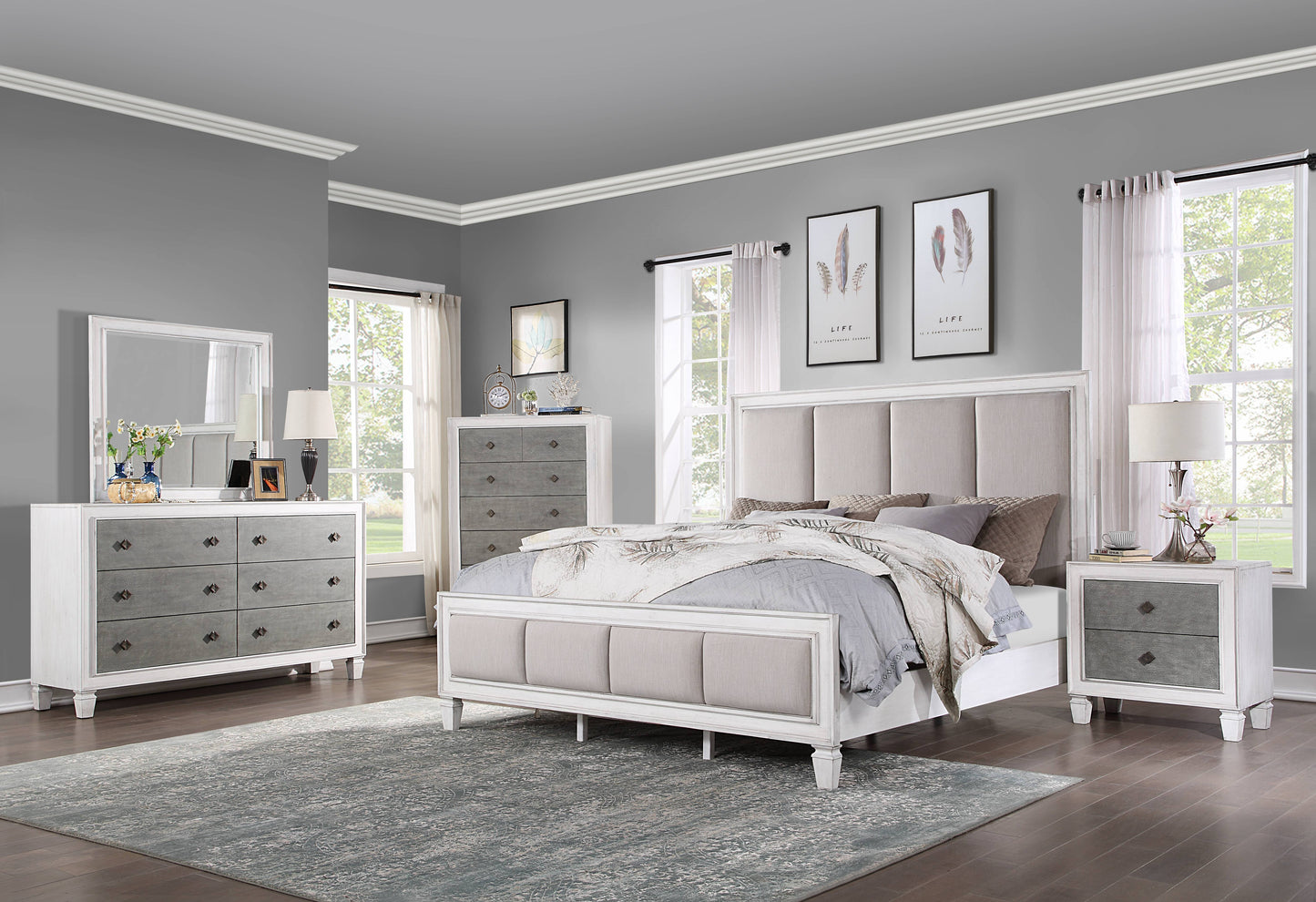 White tufted headboard king size bed with grey upholstered panels and matching nightstands