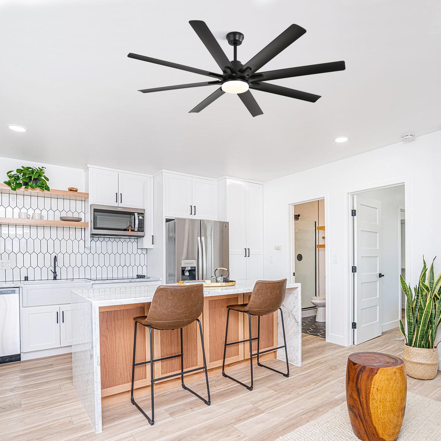Modern black ceiling fan with blades and integrated LED light fixture