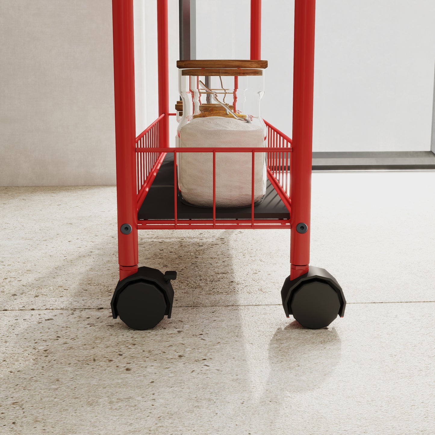 Red metal serving cart with locking wheels and clear glass storage jar