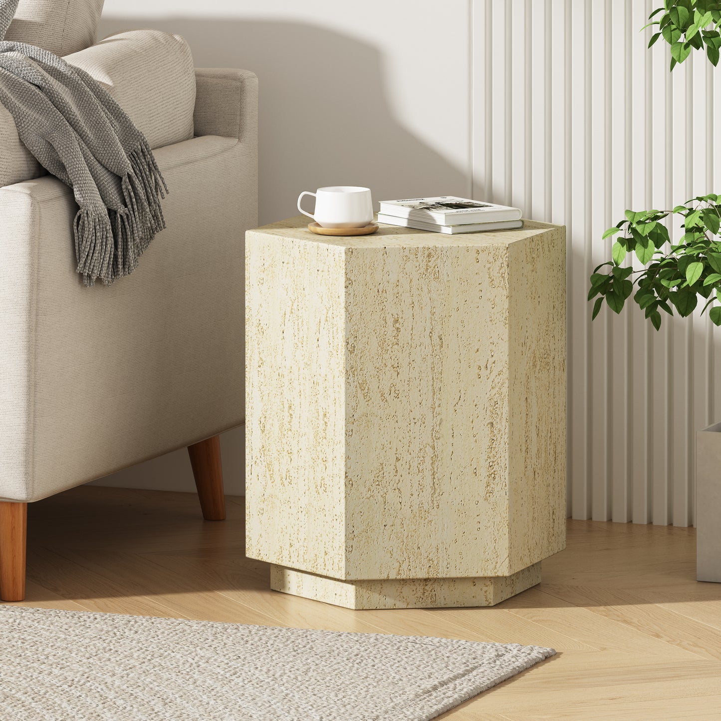 Textured cream hexagonal side table with a coffee cup and book