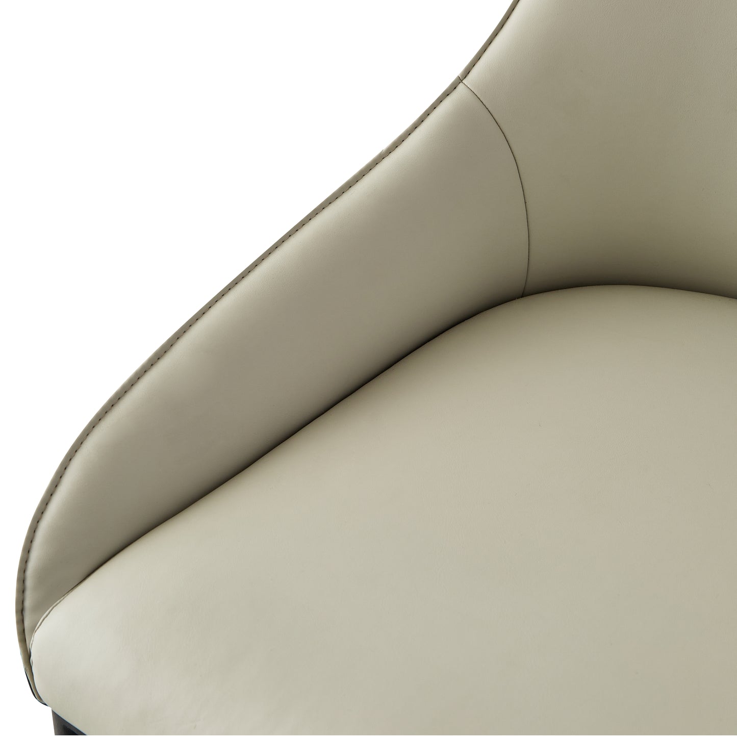Closeup of a cream leather chair seat with visible stitching detail