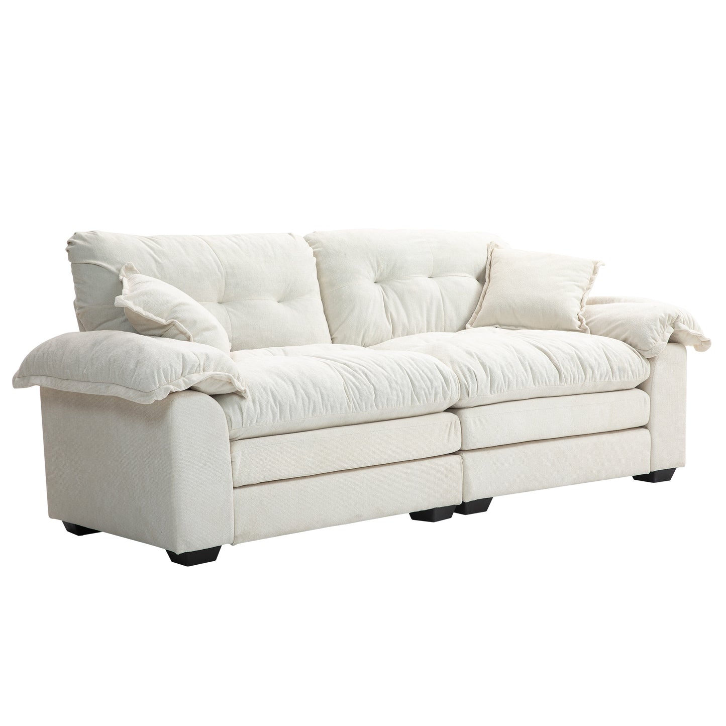 Plush cream sectional sofa with tufted cushions and cozy accent pillows
