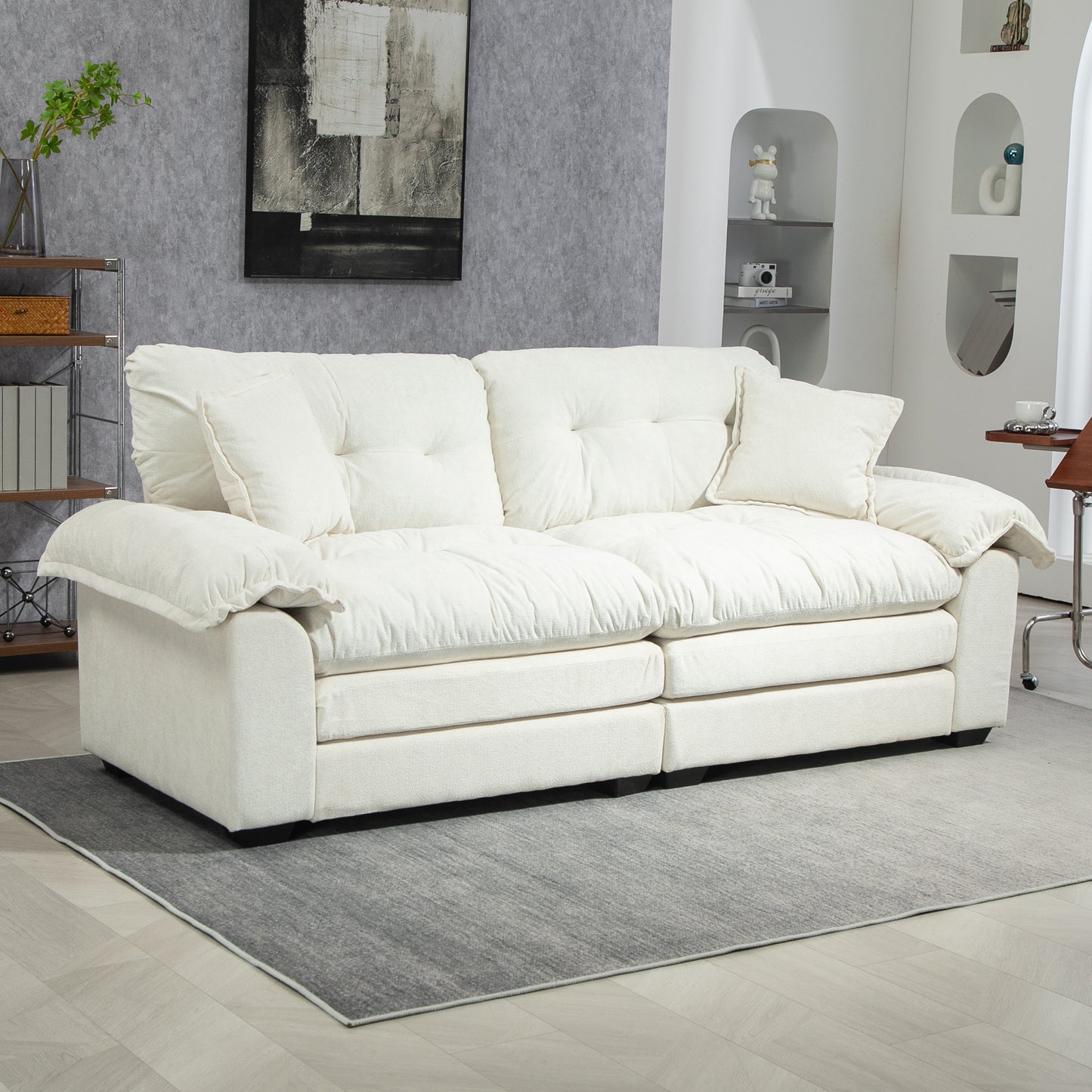 Plush cream sofa with tufted cushions perfect for modern living rooms