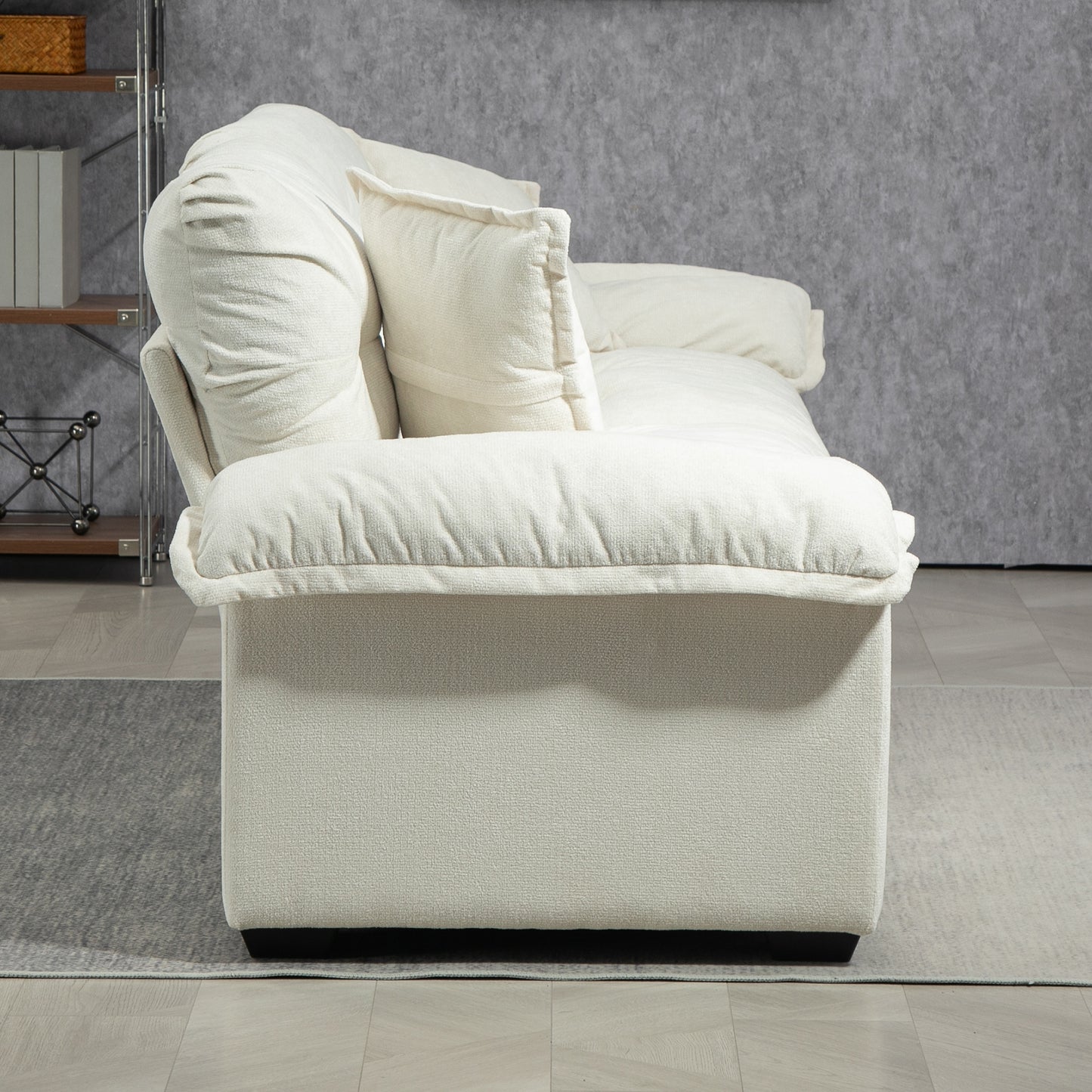 Cozy offwhite boucle fabric sofa with plush cushions and a low profile design