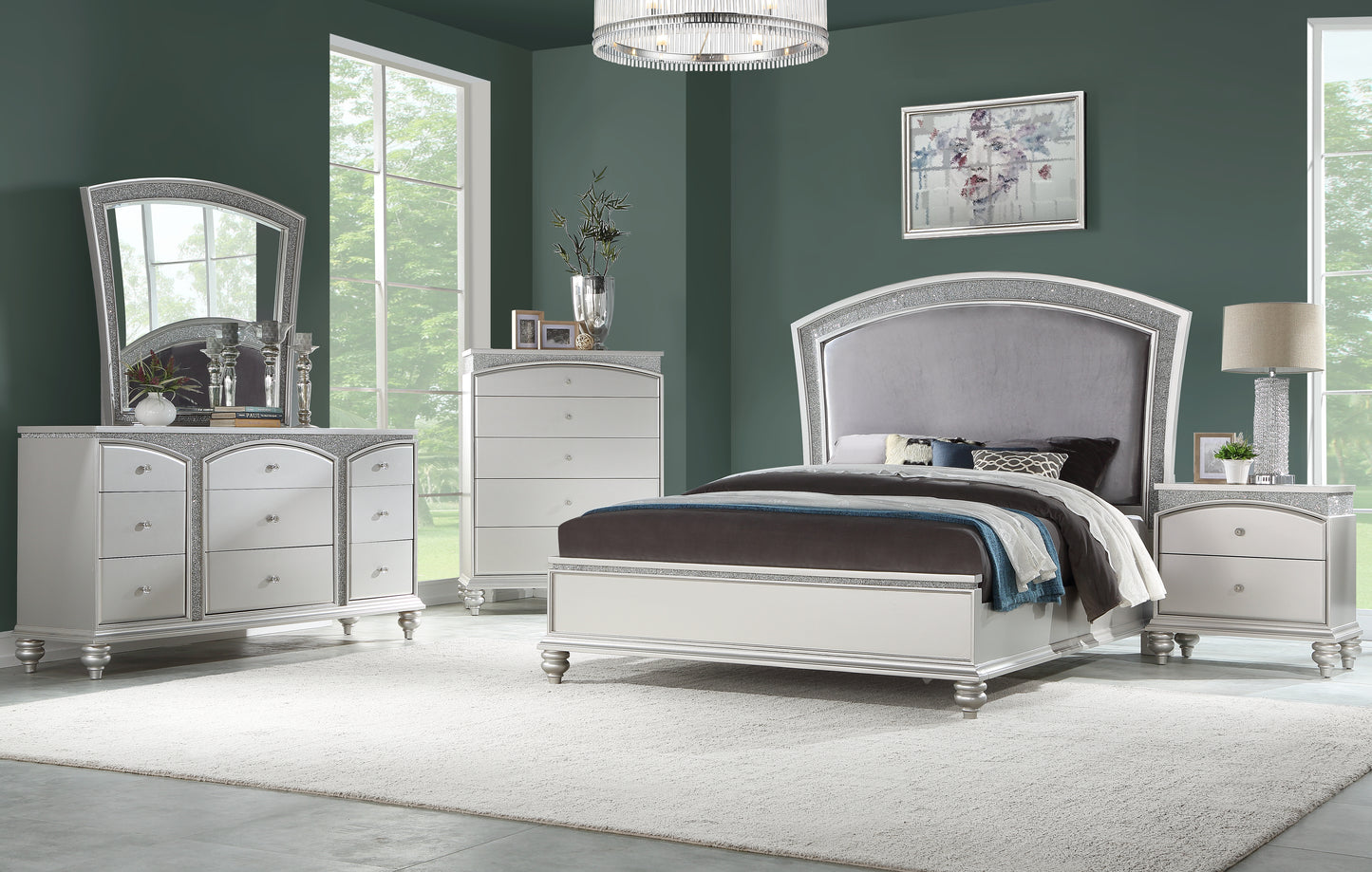 Silver upholstered queen bed with crystal accents and ornate details