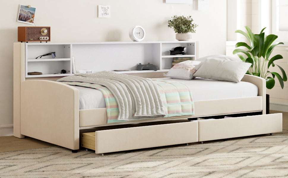Beige upholstered daybed with integrated bookshelf and two storage drawers