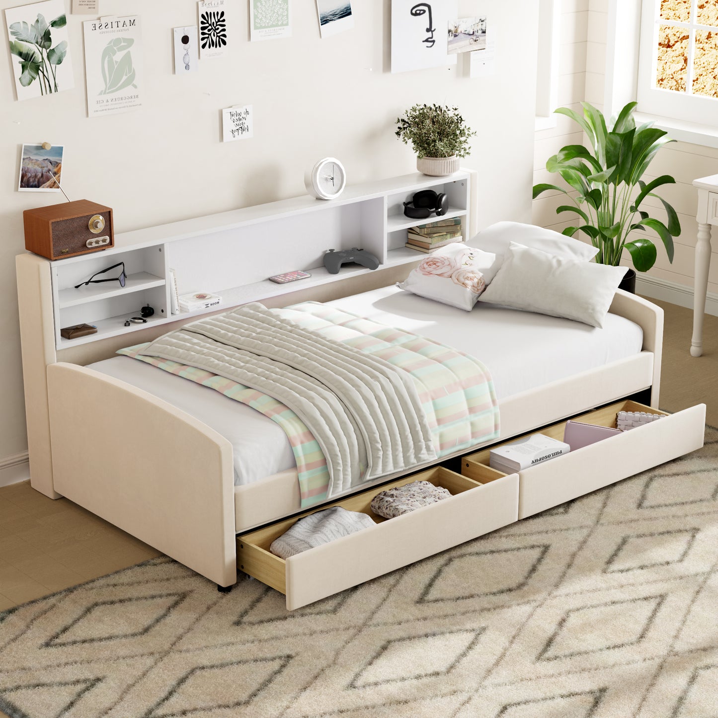 Beige upholstered daybed with headboard storage and pullout drawers for organized living