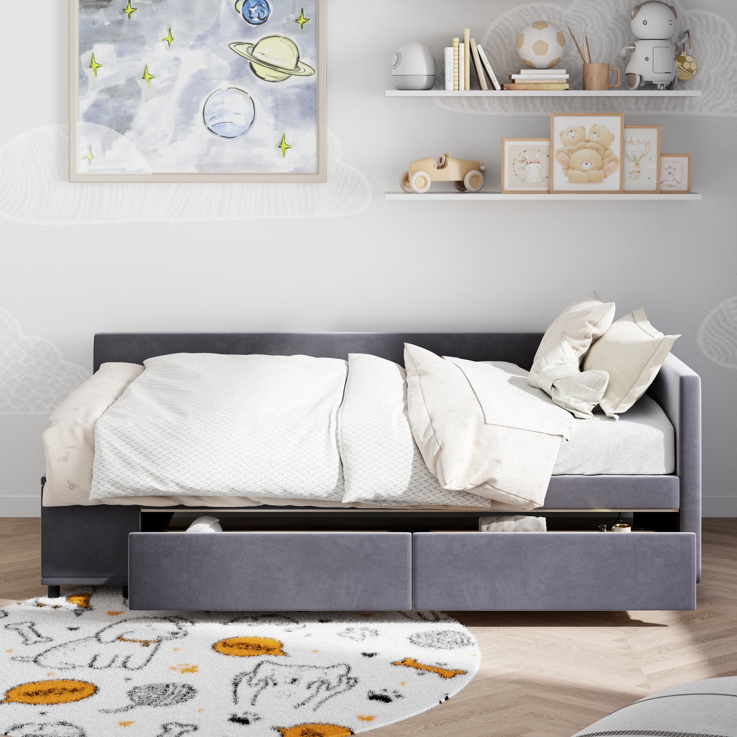 Gray upholstered daybed with white bedding and integrated storage drawers
