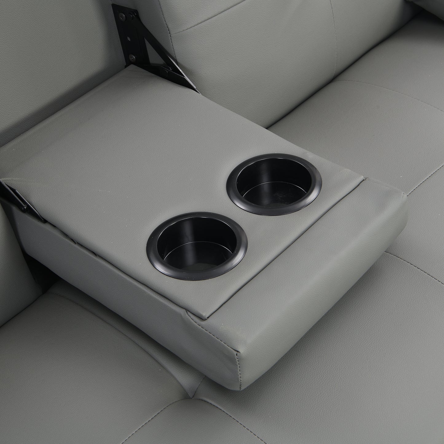 Gray faux leather loveseat with convenient dual cup holders built into the center console