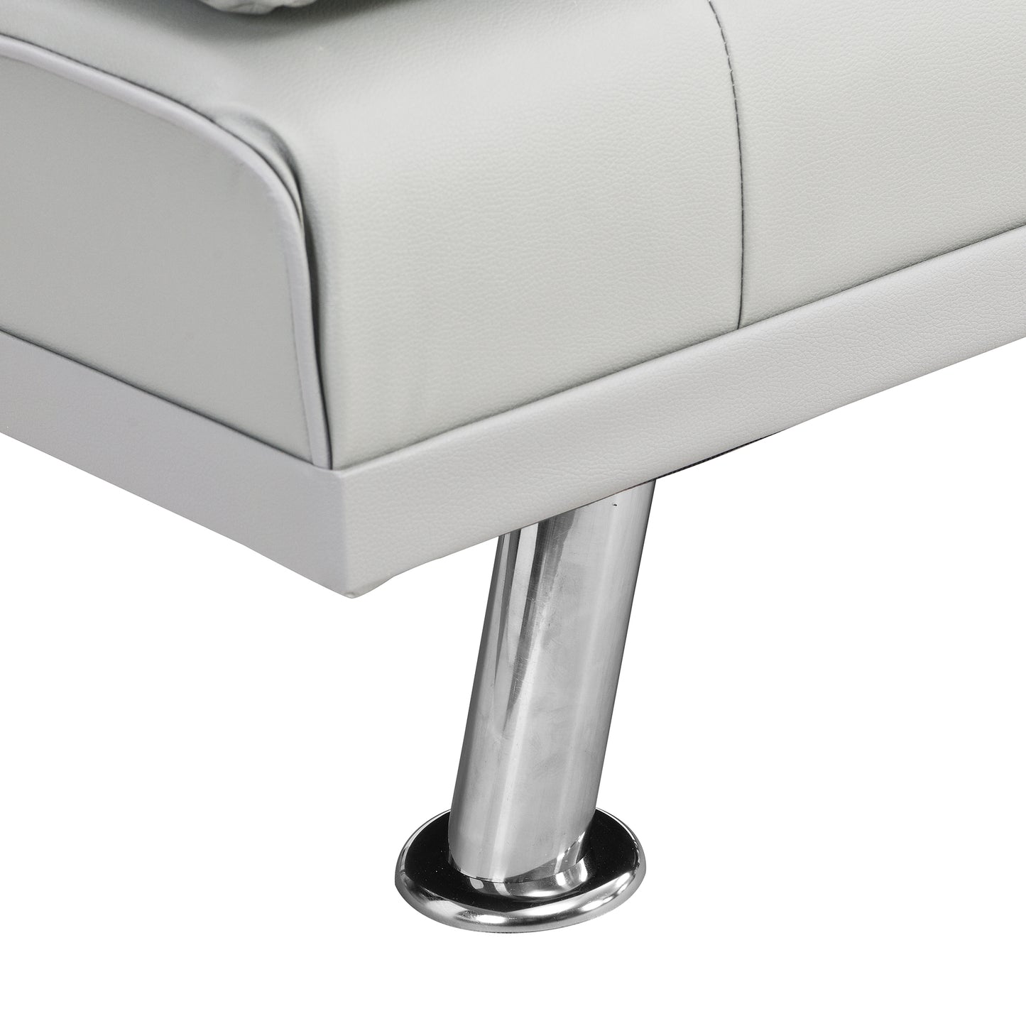 Closeup of white faux leather couch corner with sleek chrome leg