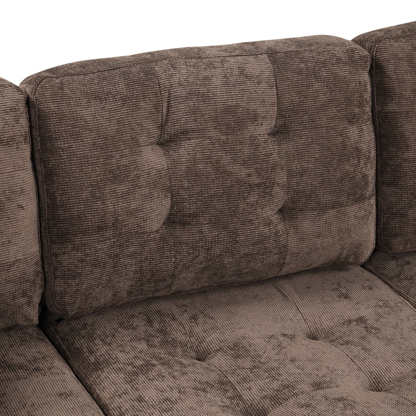 Brown corduroy tufted sofa cushion with textured fabric detail