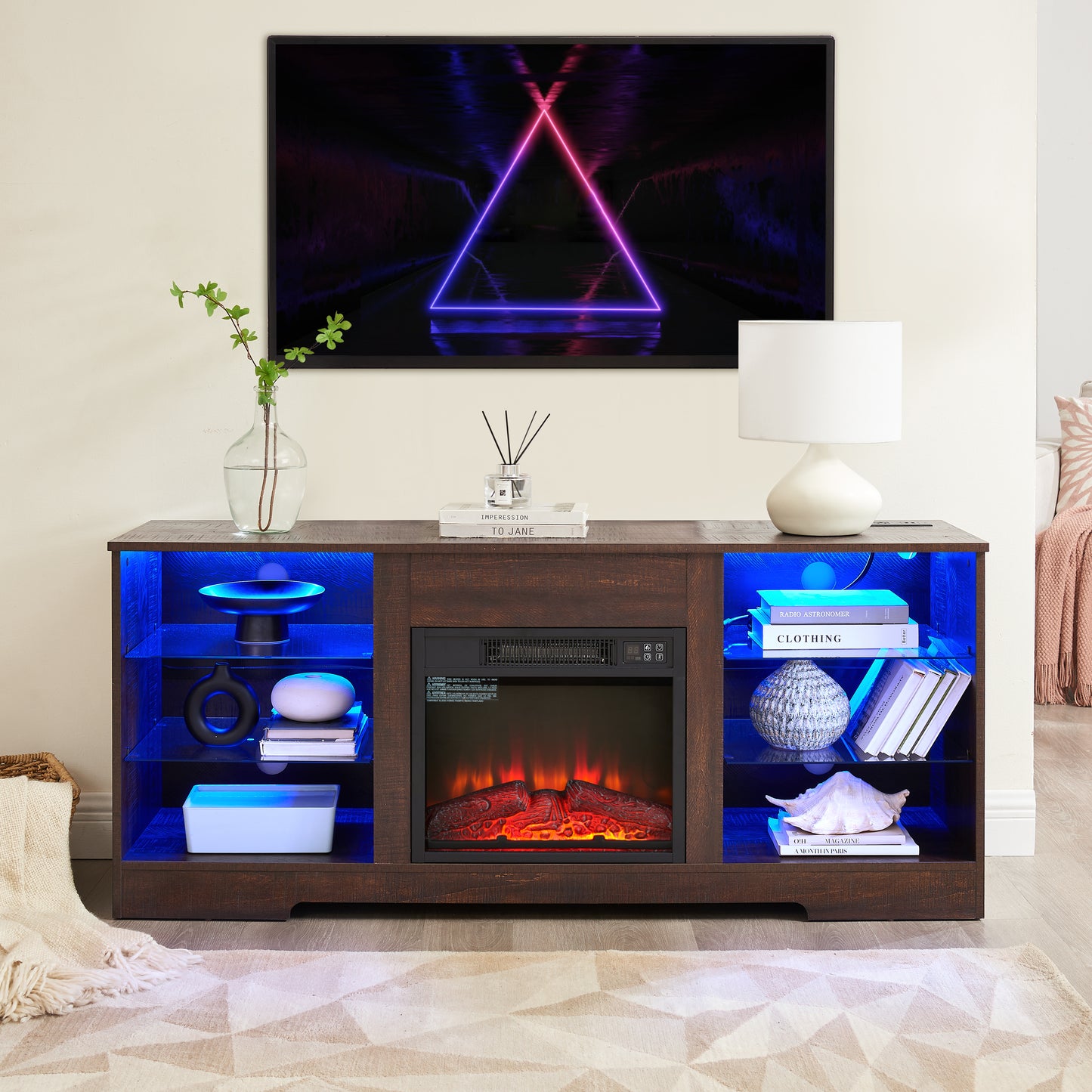 Dark wood media console with electric fireplace and blue LED lighting