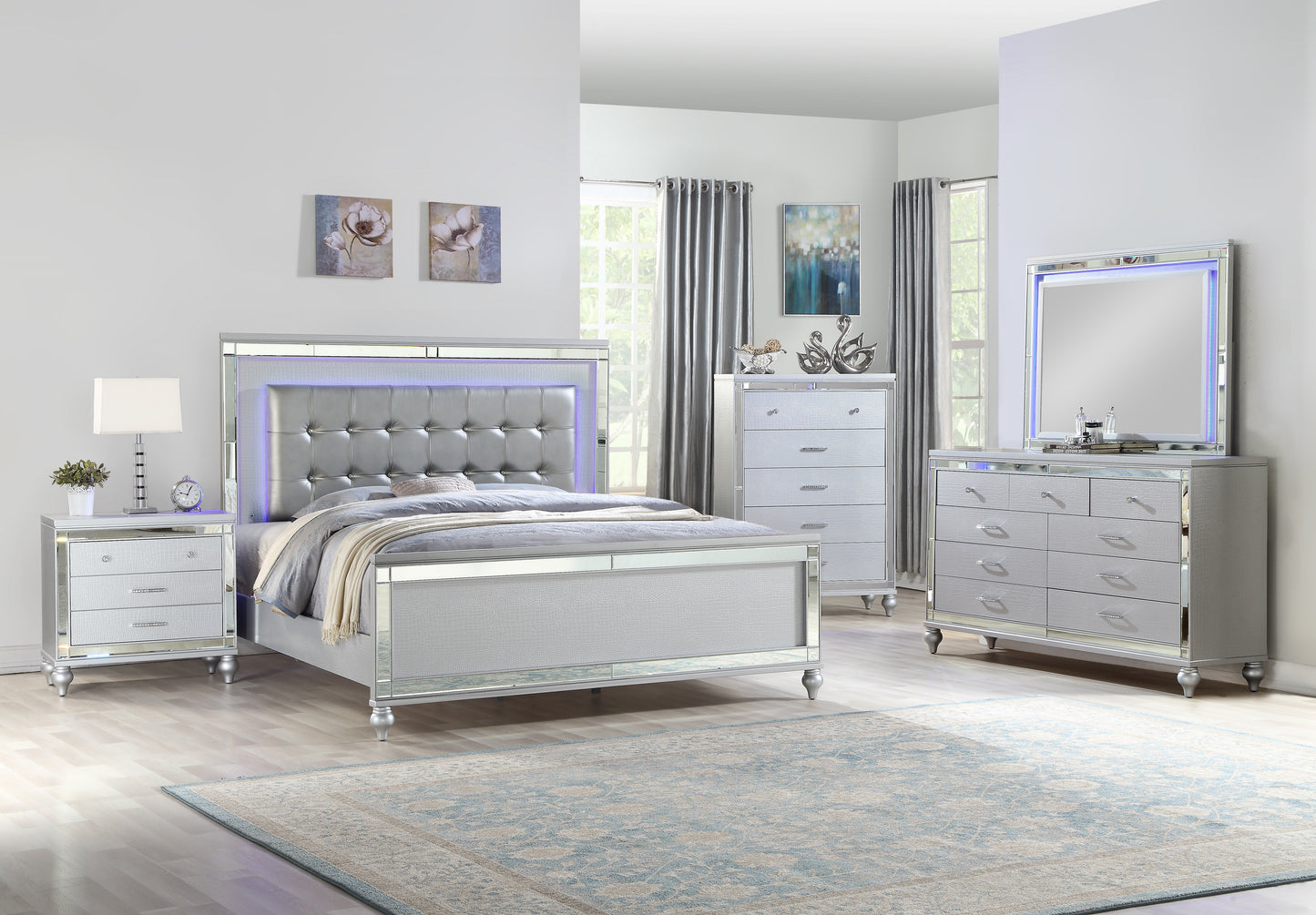 Luxurious silver upholstered bed with LED lighting and crystal tufting for a modern bedroom
