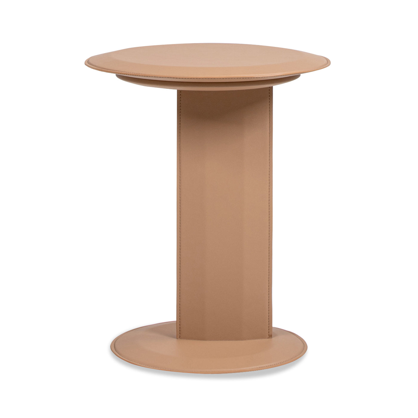 Elegant tan leather accent table with a rounded top and base perfect for modern living spaces