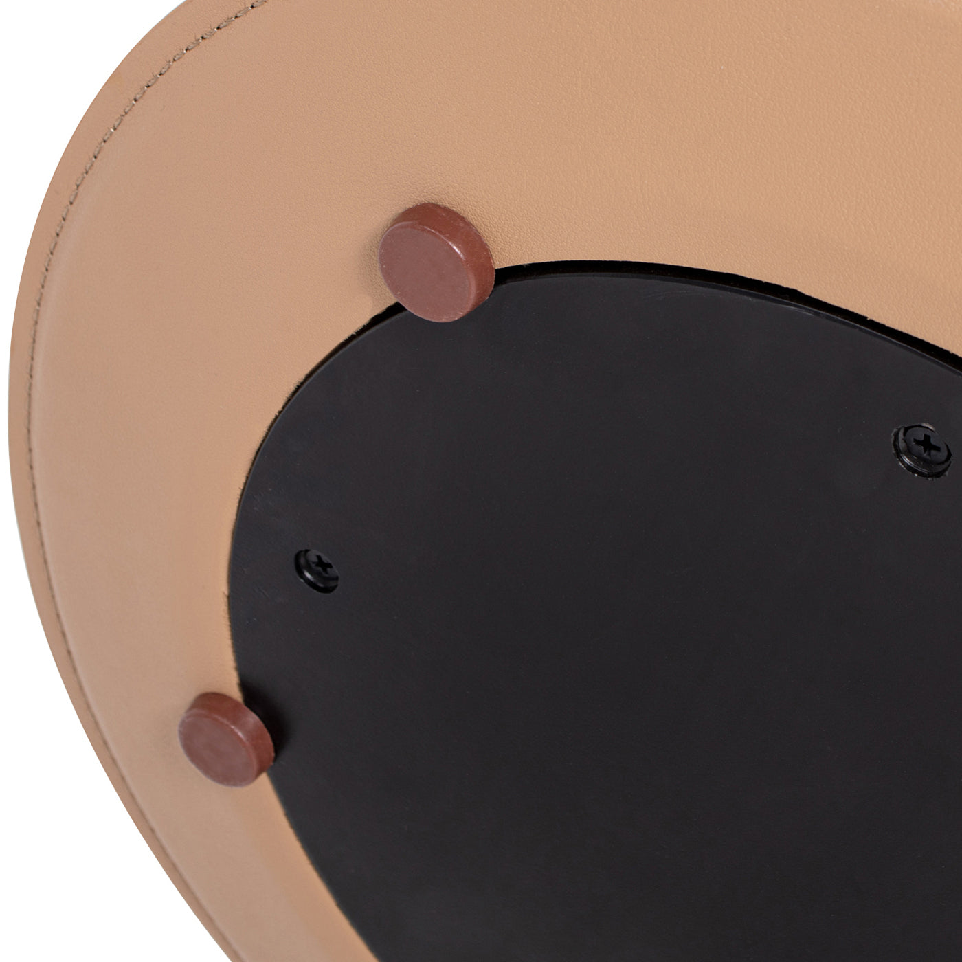 Close up of beige leather ottoman base with brown rubber feet and black center
