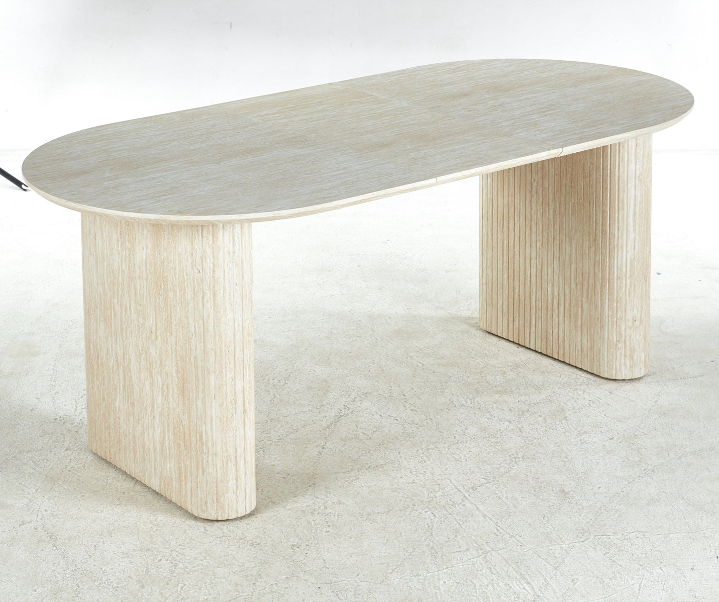 Pale wood oval desk with fluted column legs