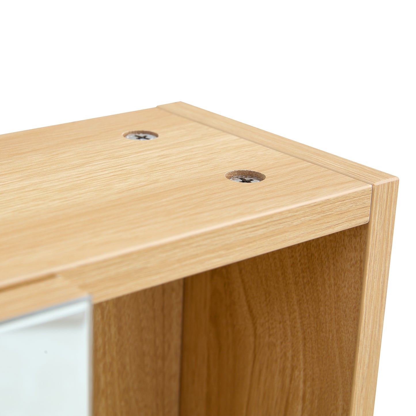 Closeup of light oak veneer shelf with visible screws ideal for modern furniture assembly