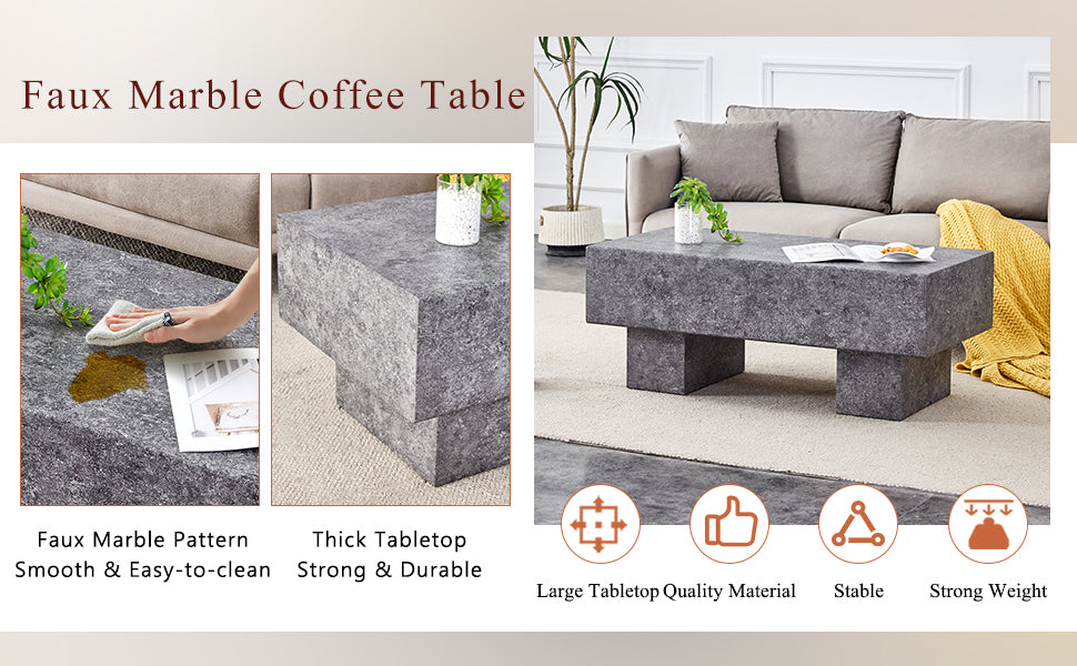 Modern rectangular faux marble coffee table with a dark grey textured finish