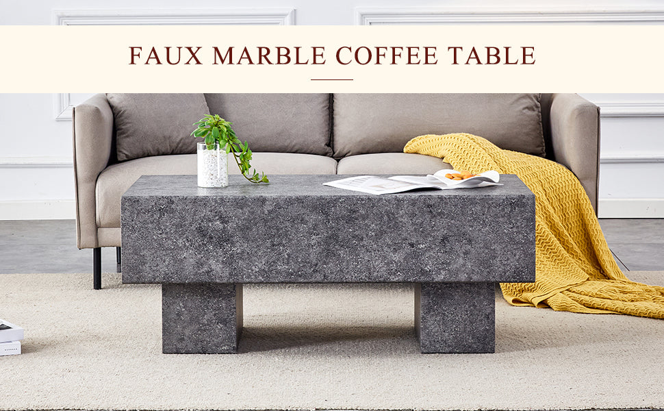 Dark grey faux marble coffee table with minimalist design