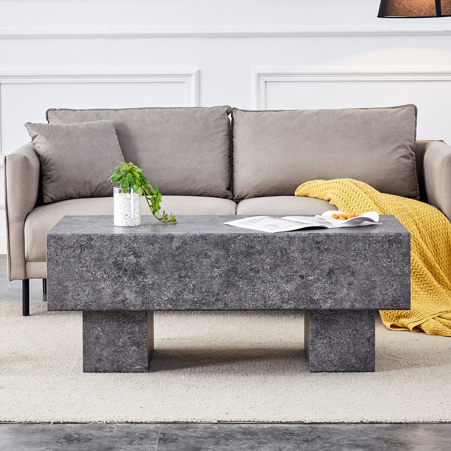 Modern gray concrete coffee table with minimalist design perfect for living rooms
