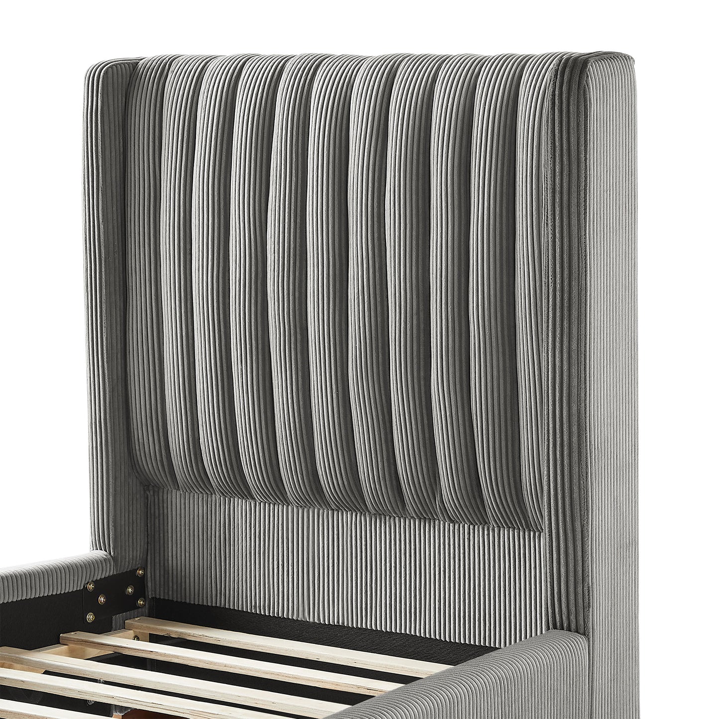 Close up of a grey corduroy upholstered bed frame with vertical channel tufting