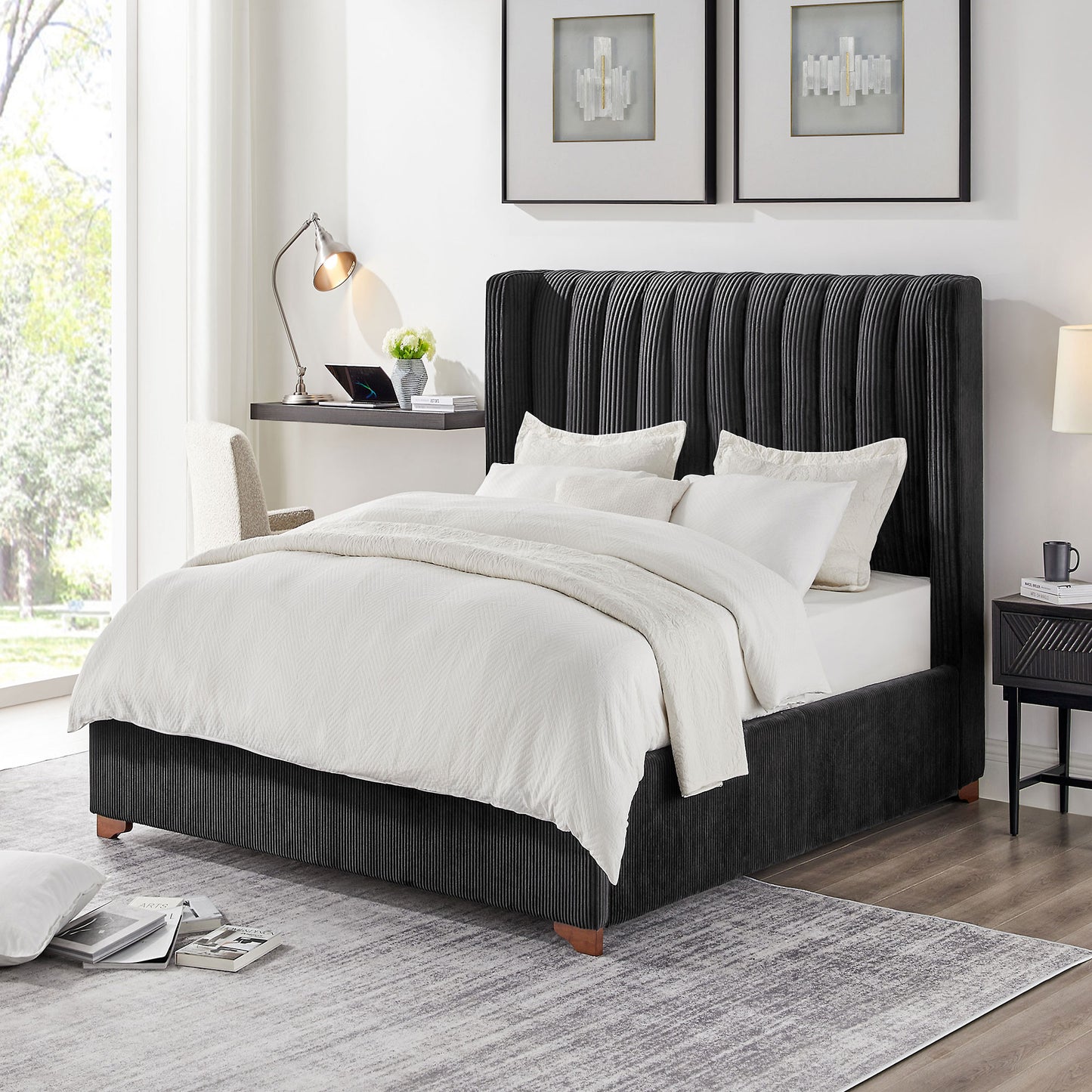 Black velvet king bed with vertical channel tufting white bedding and wood legs