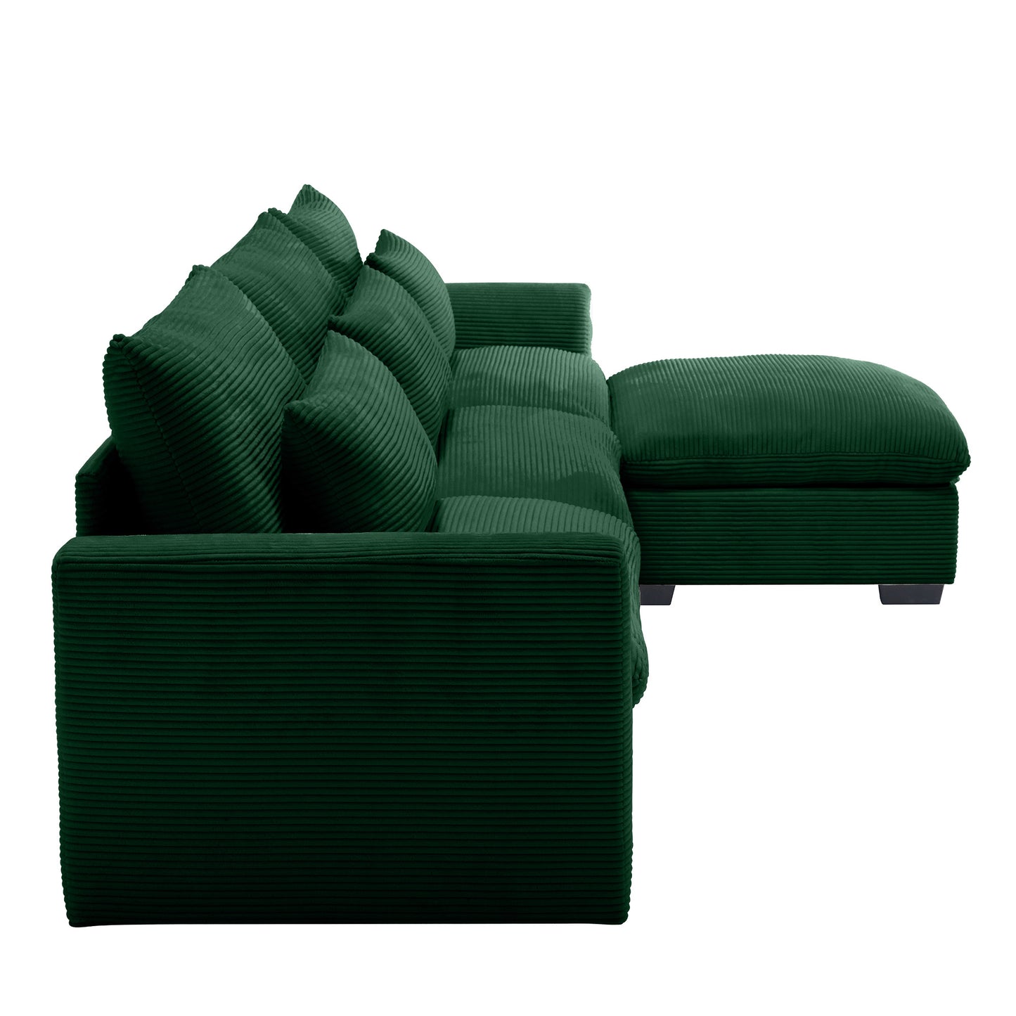 Dark green corduroy sectional sofa with plush cushions and ottoman