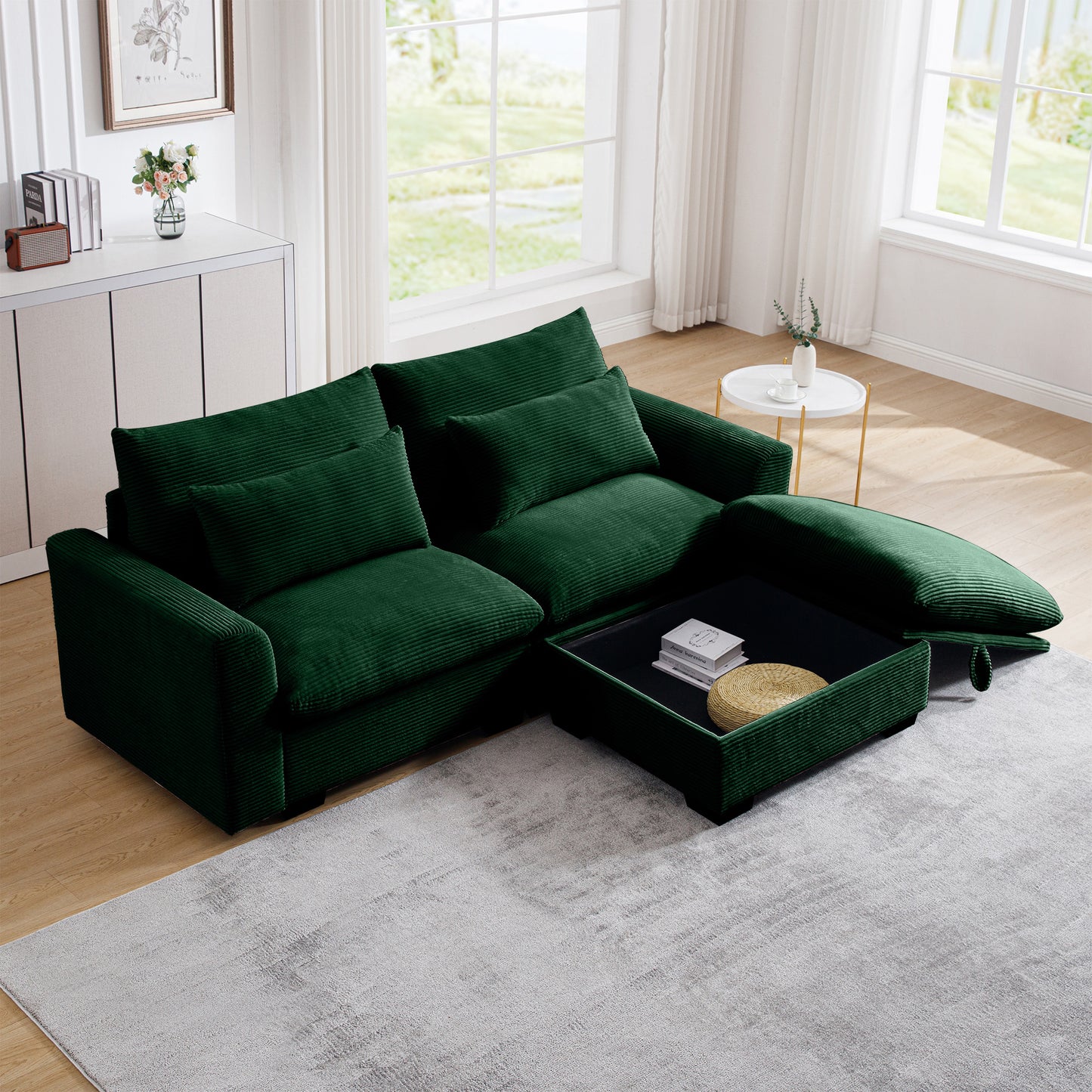 Deep green corduroy sectional sofa with plush cushions and builtin coffee table