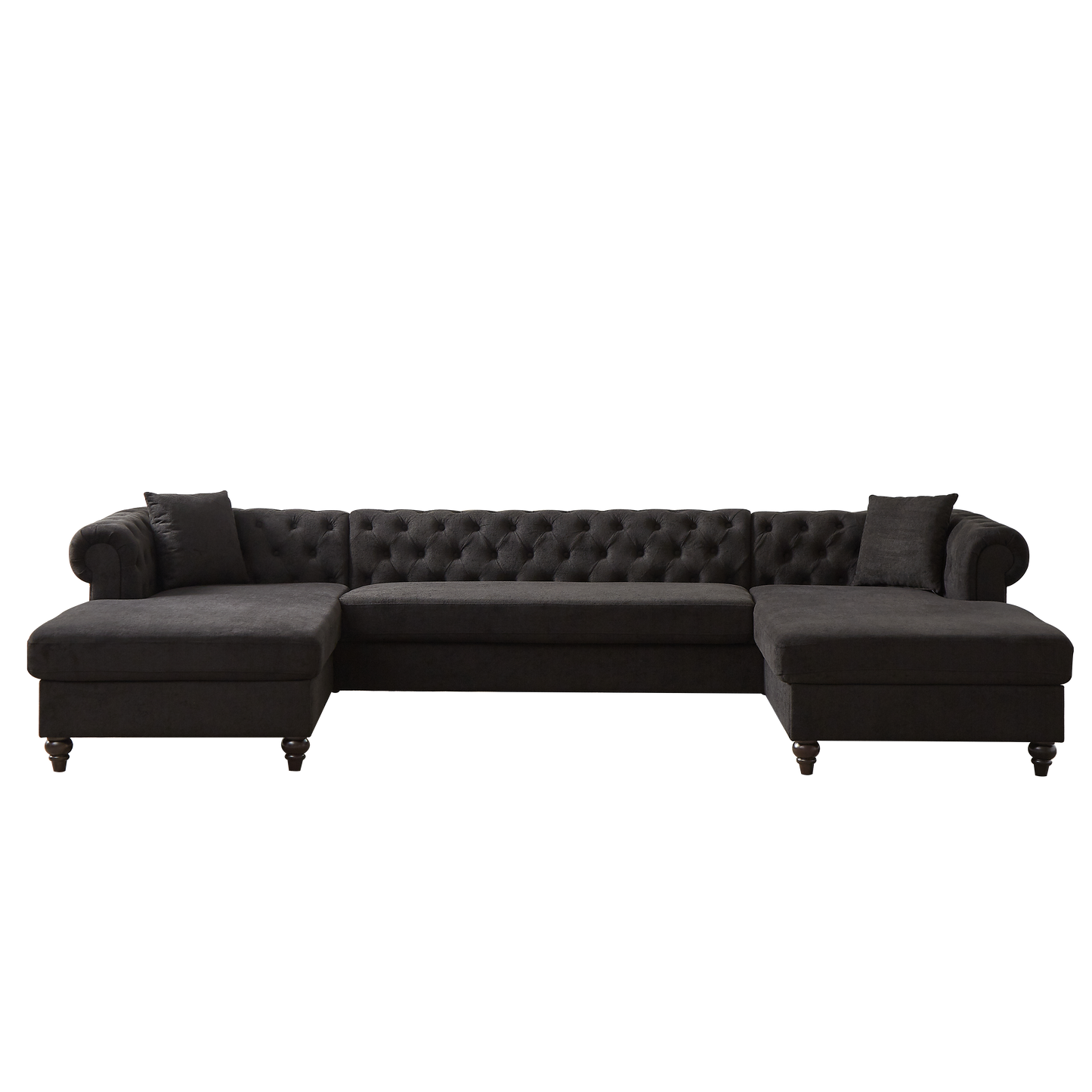 Dark charcoal grey tufted sectional sofa with chaise lounges and rolled arms perfect for a modern living room