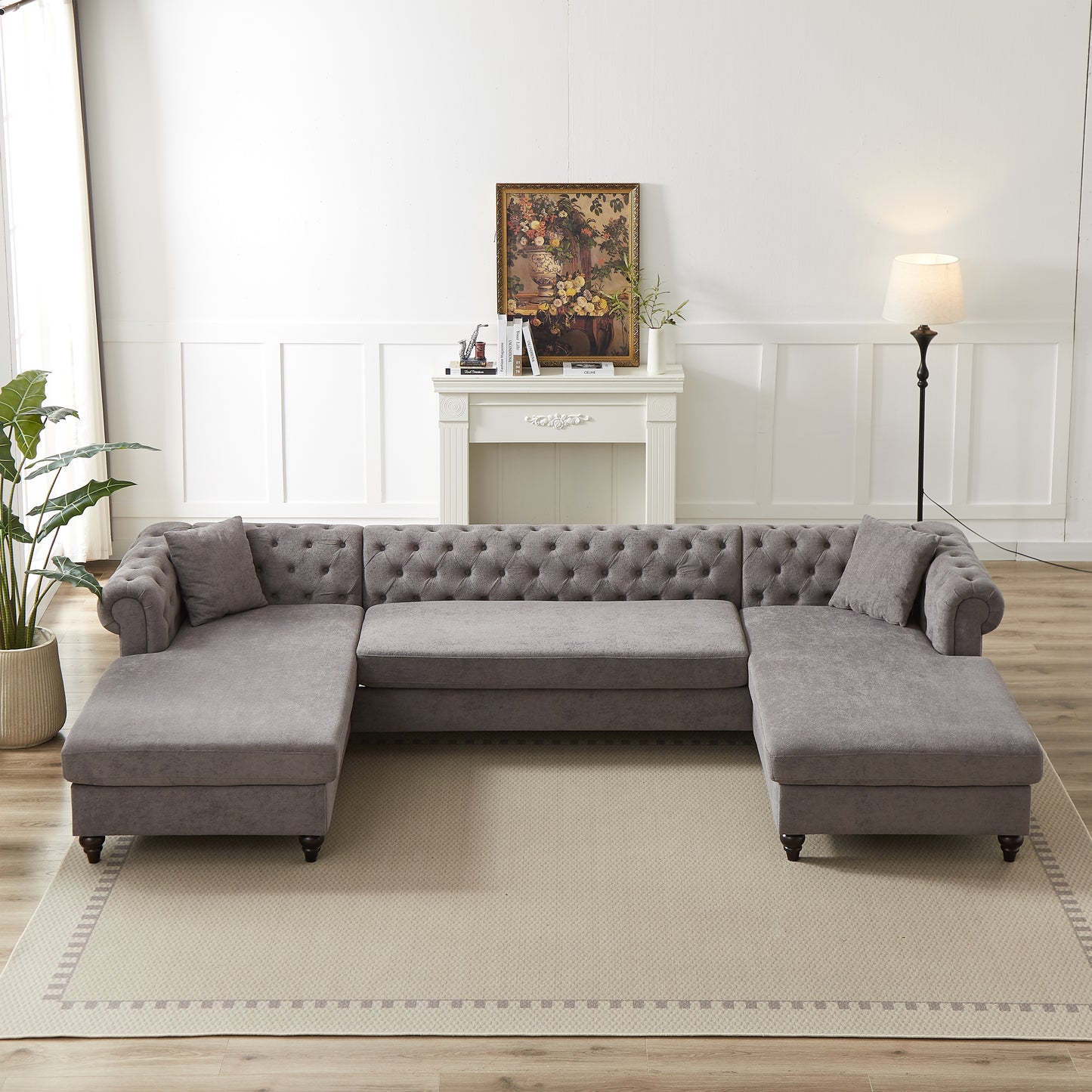 Ushaped grey velvet sectional sofa with tufted back cushions and chaise