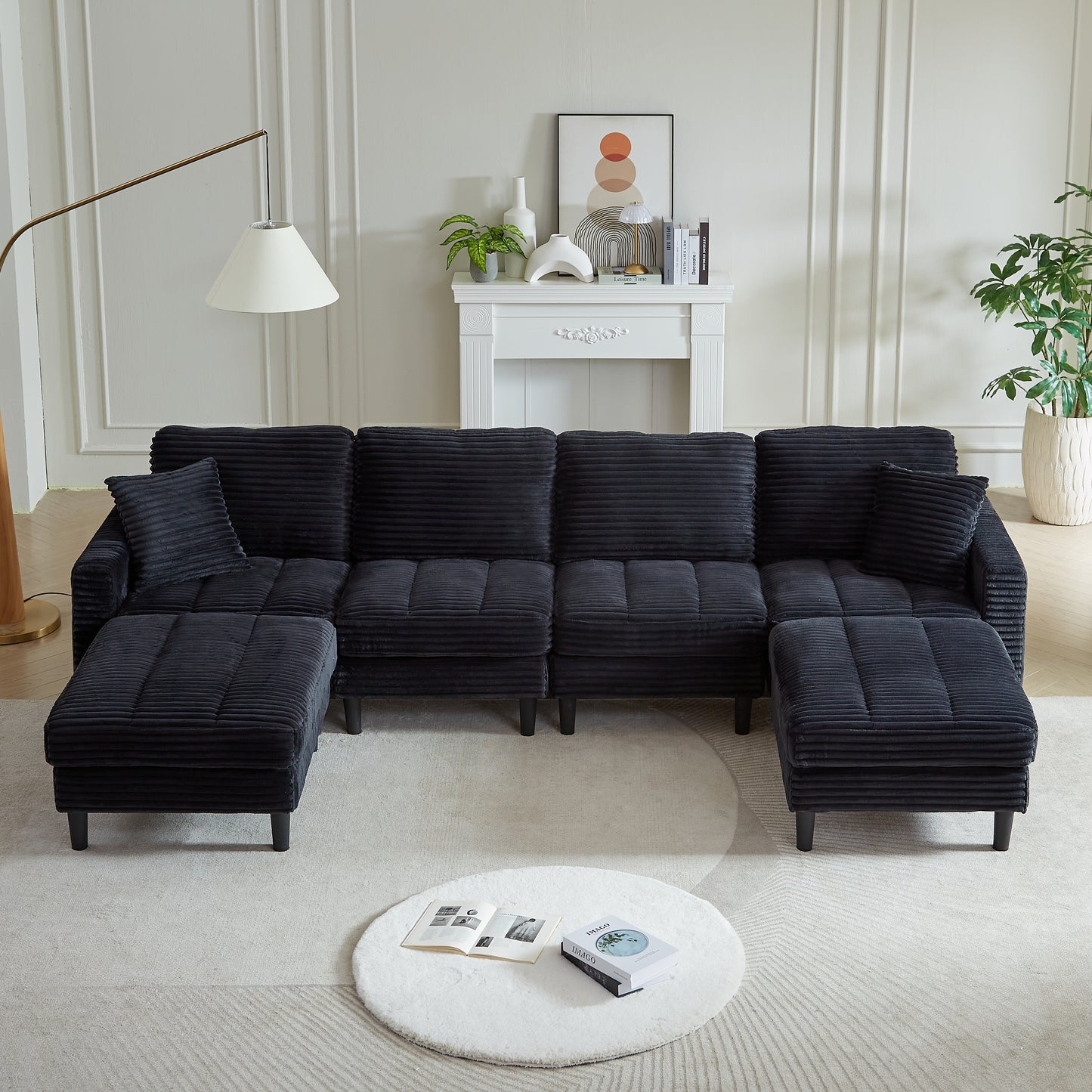 Deep charcoal corduroy sectional sofa with plush cushions and matching ottomans ideal for modern living rooms