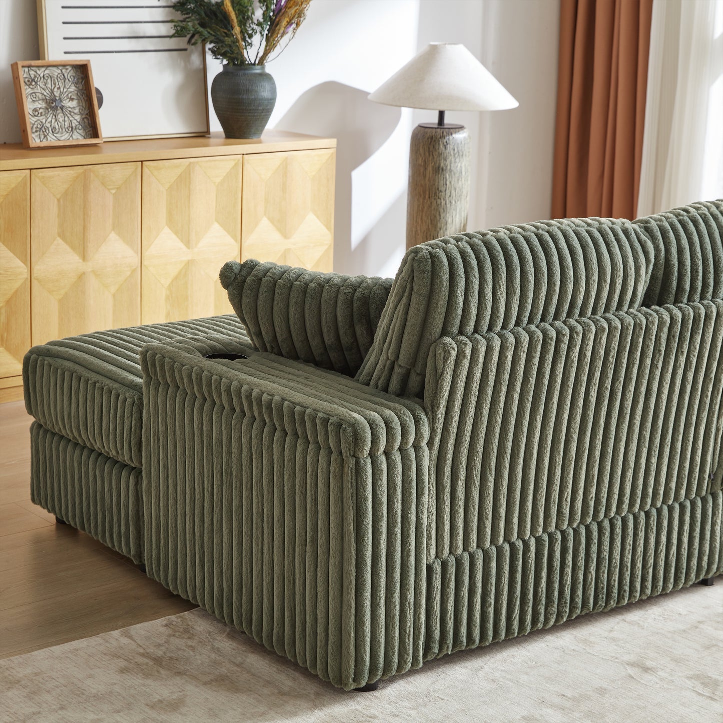 Green corduroy sectional sofa with plush texture perfect for modern living rooms