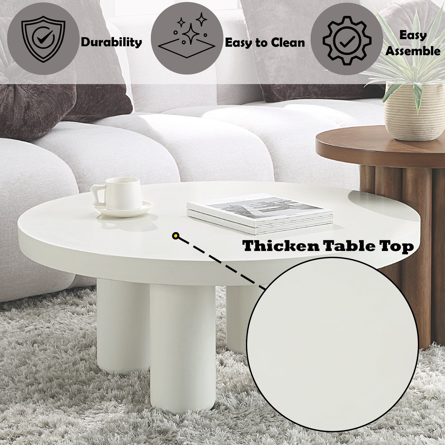 Modern white round coffee table with three tapered legs perfect for living room decor