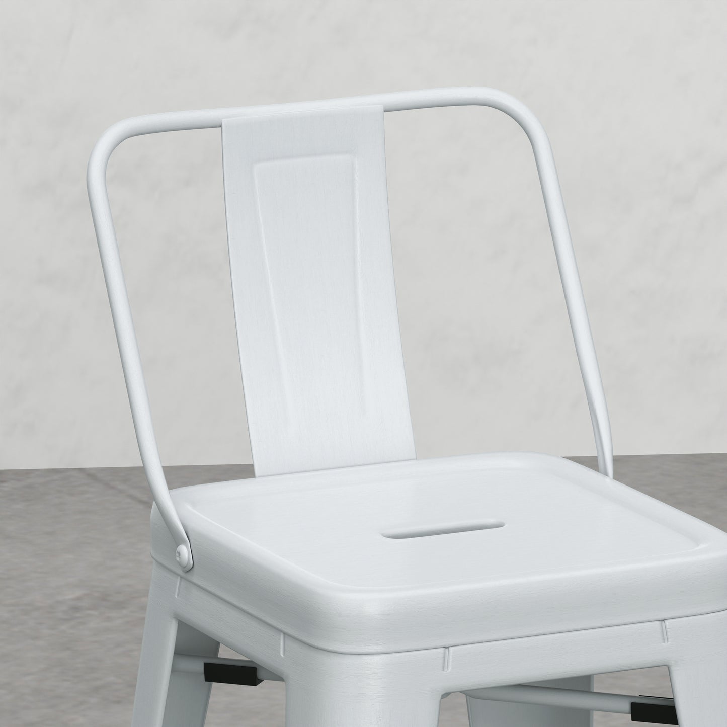 White metal industrial stool with curved backrest and cutout seat