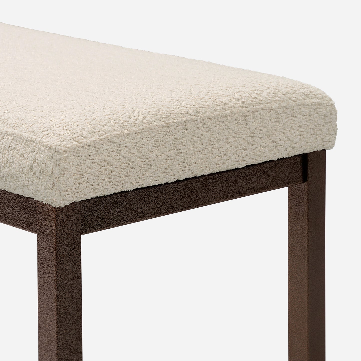 Cream textured upholstered bench with dark brown metal legs