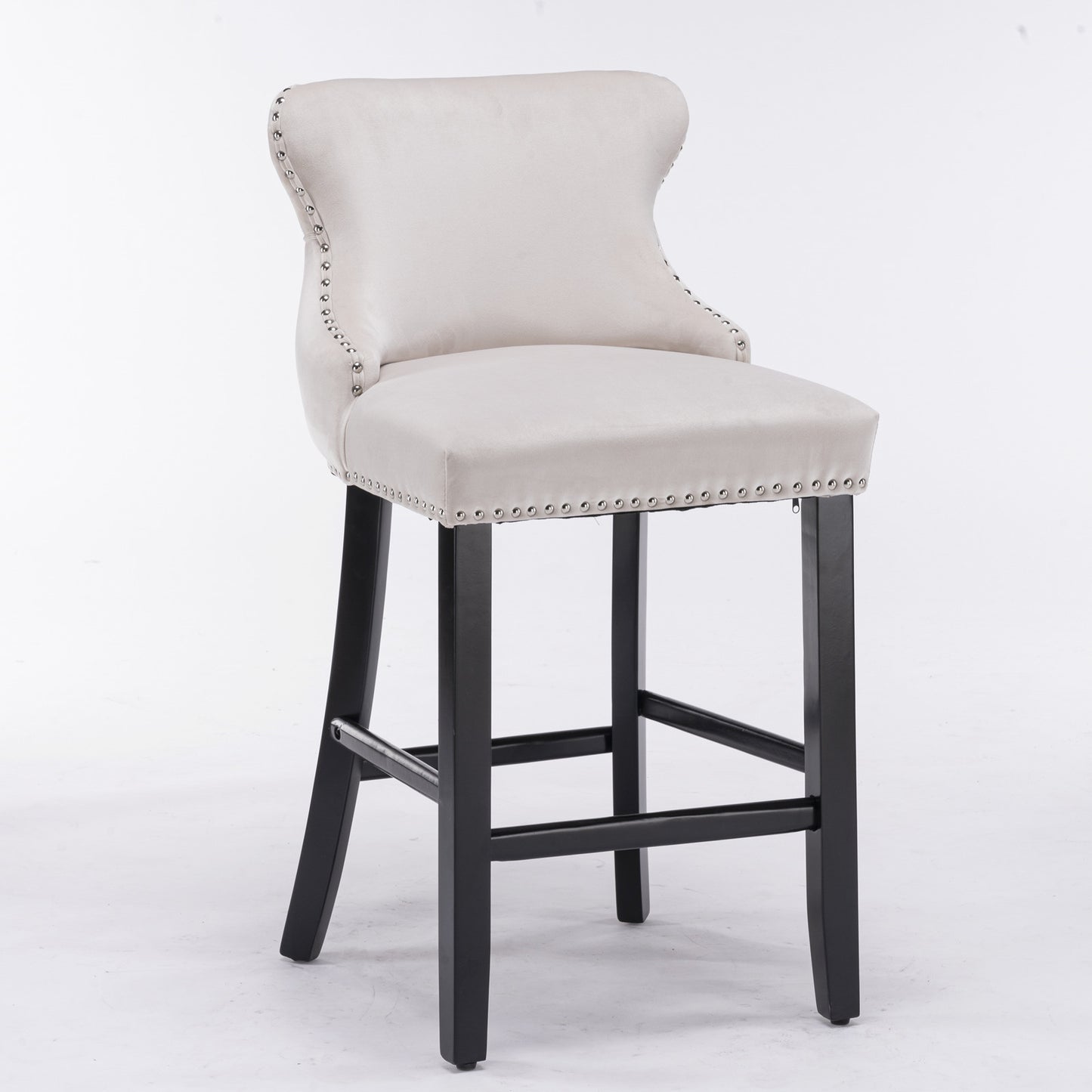 Cream velvet bar stool with silver nailhead trim and black wooden legs