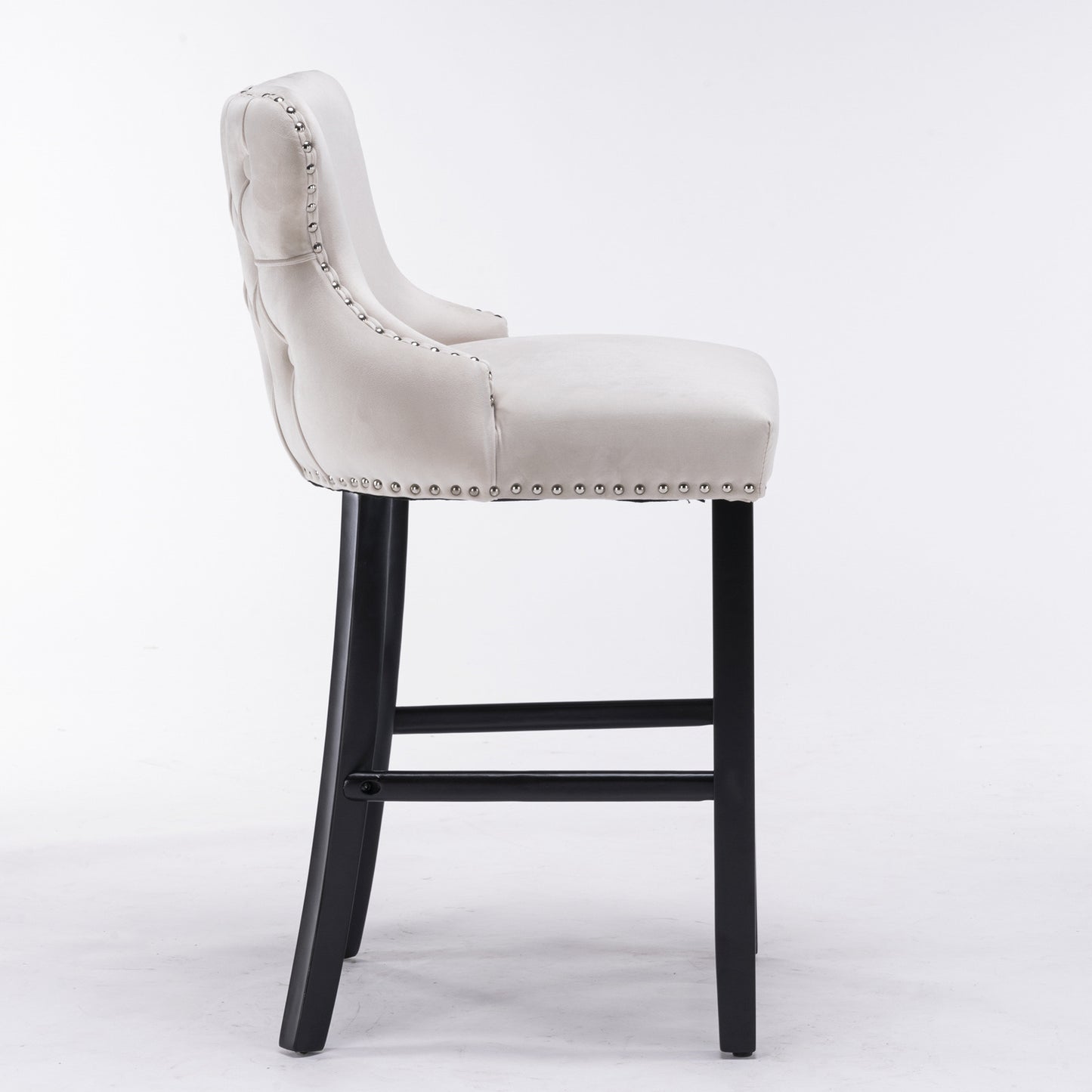 Cream velvet tufted bar stool with silver nailhead trim and black legs