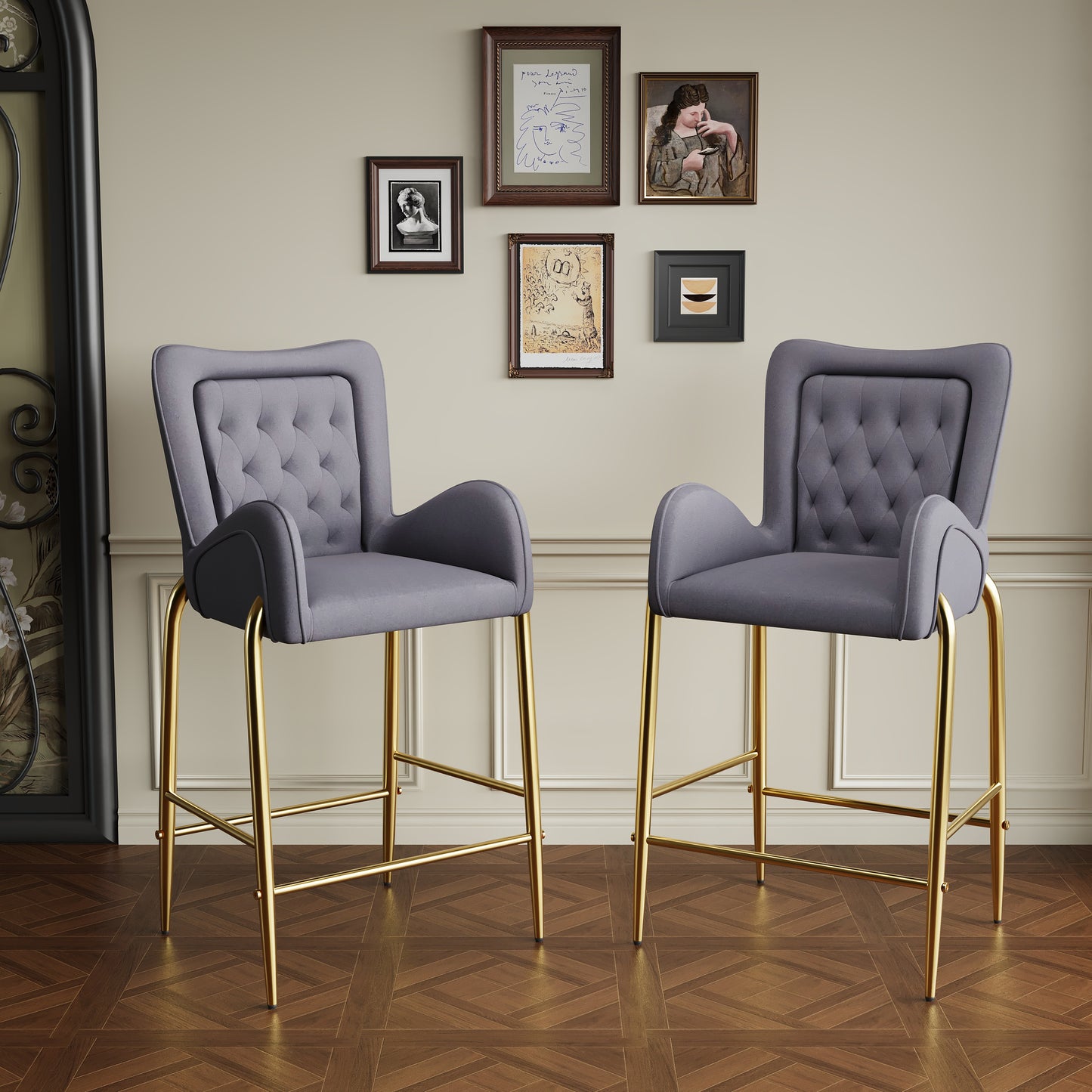 Two grey velvet tufted bar stools with gold legs perfect for a modern kitchen island