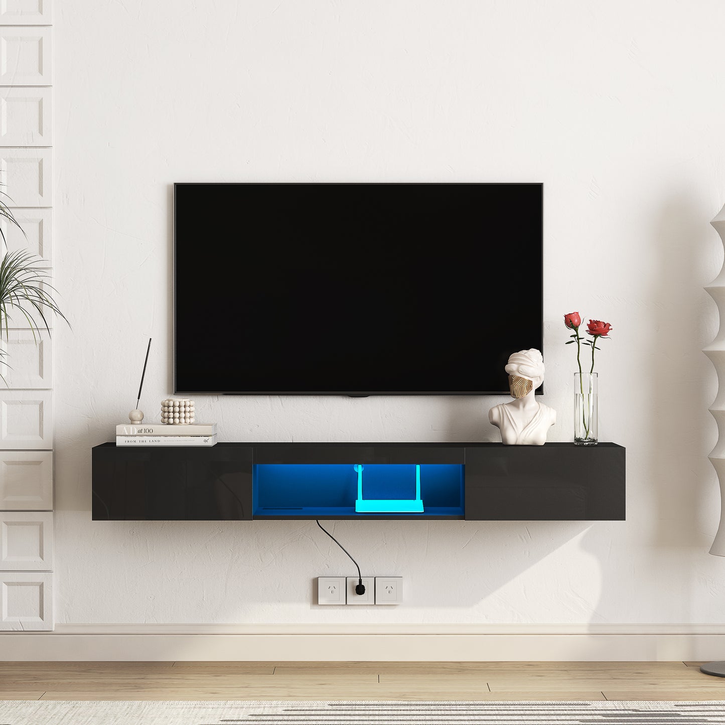 Sleek black floating TV stand with blue LED lighting ideal for modern living rooms