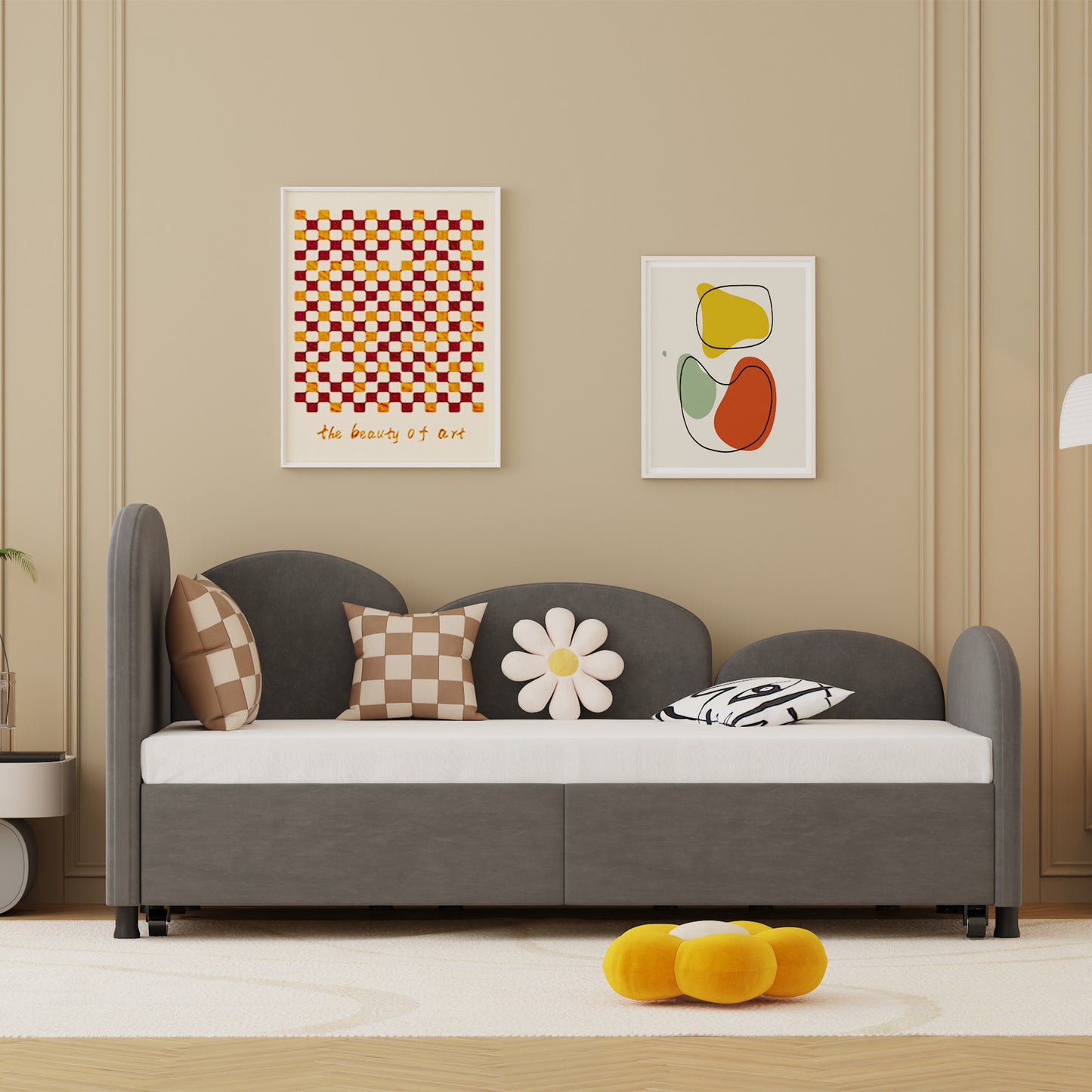 Dark gray velvet daybed with curved arms and checkered pillows for a modern living room