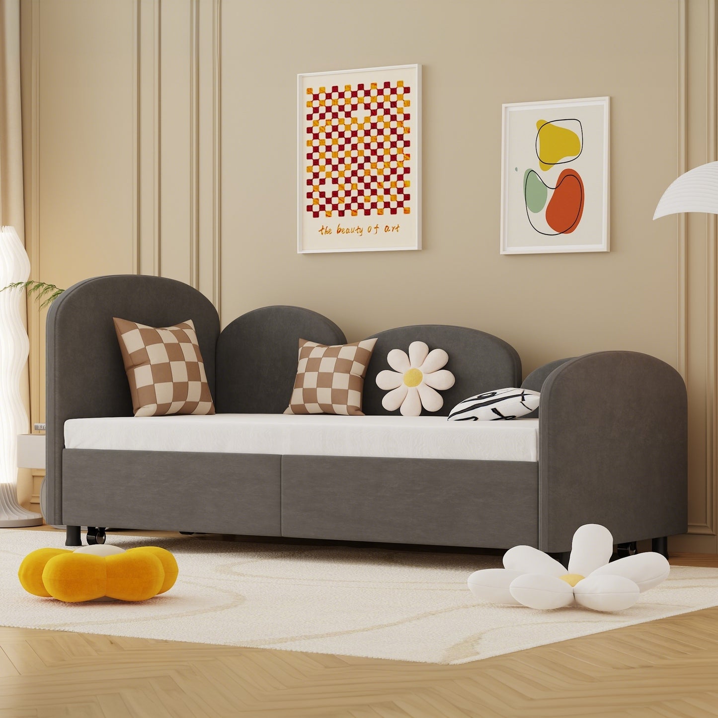 Dark gray upholstered kids bed with curved headboards and checkered pillows