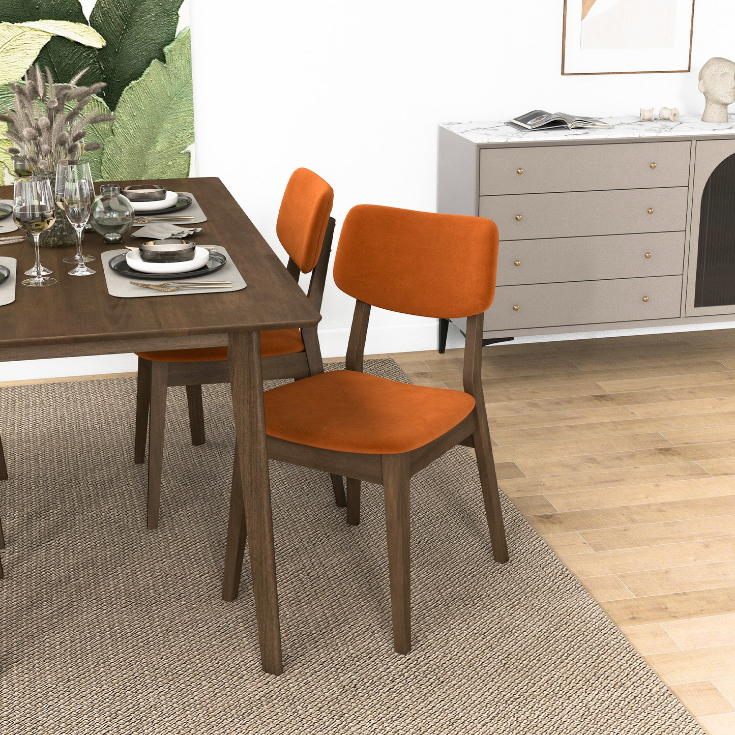 Modern orange velvet dining chair with dark wood frame and tapered legs