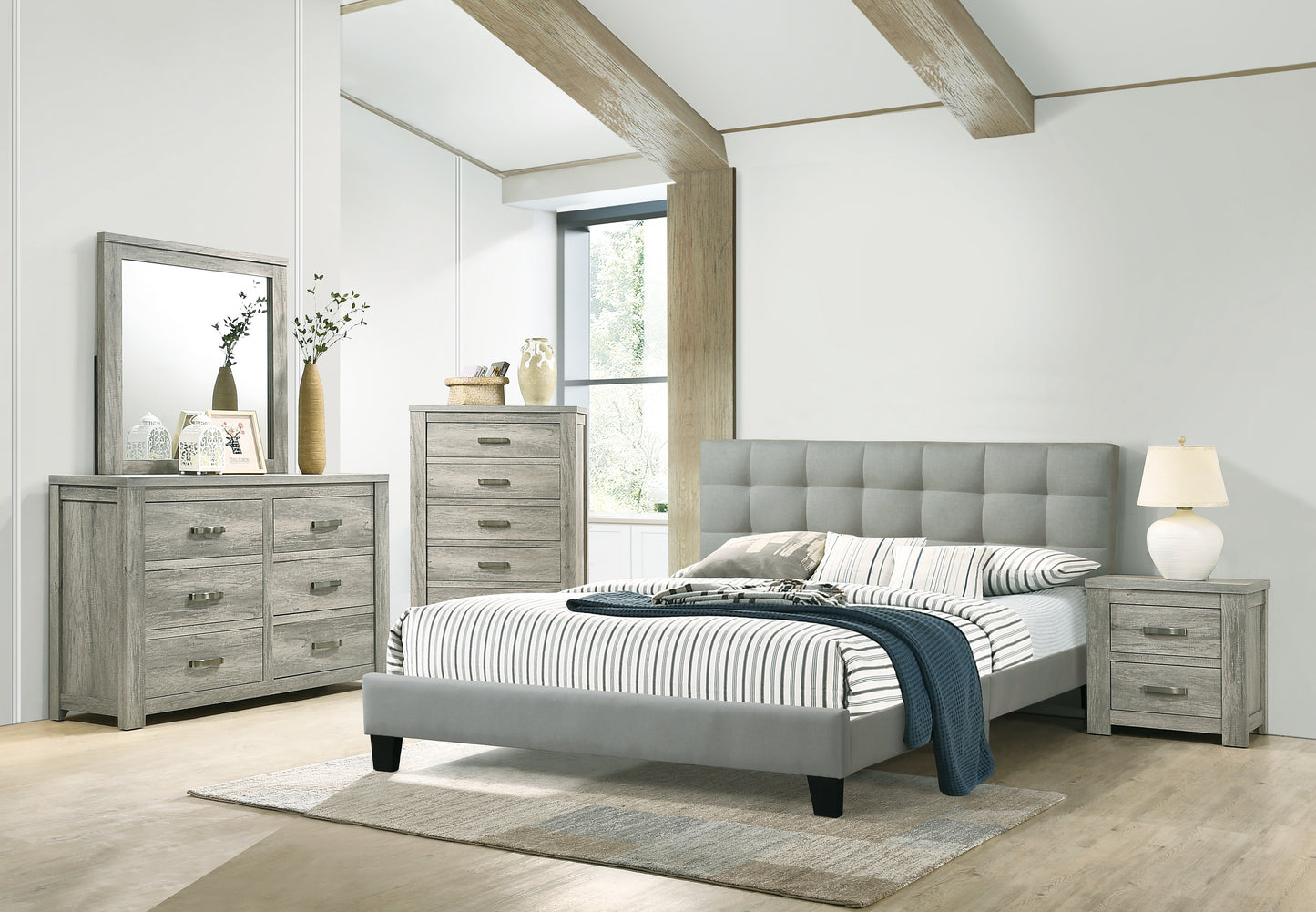 Grey upholstered king bed frame with tufted headboard and matching nightstand
