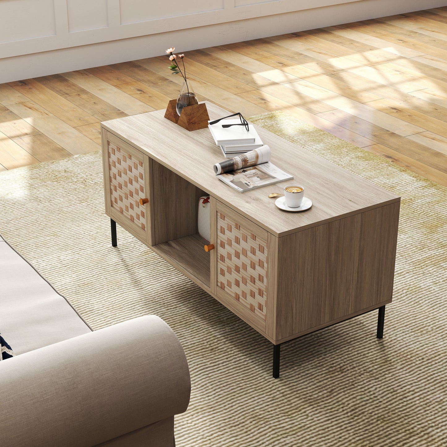Light oak veneer coffee table with woven cabinet doors and black metal legs perfect for modern living rooms