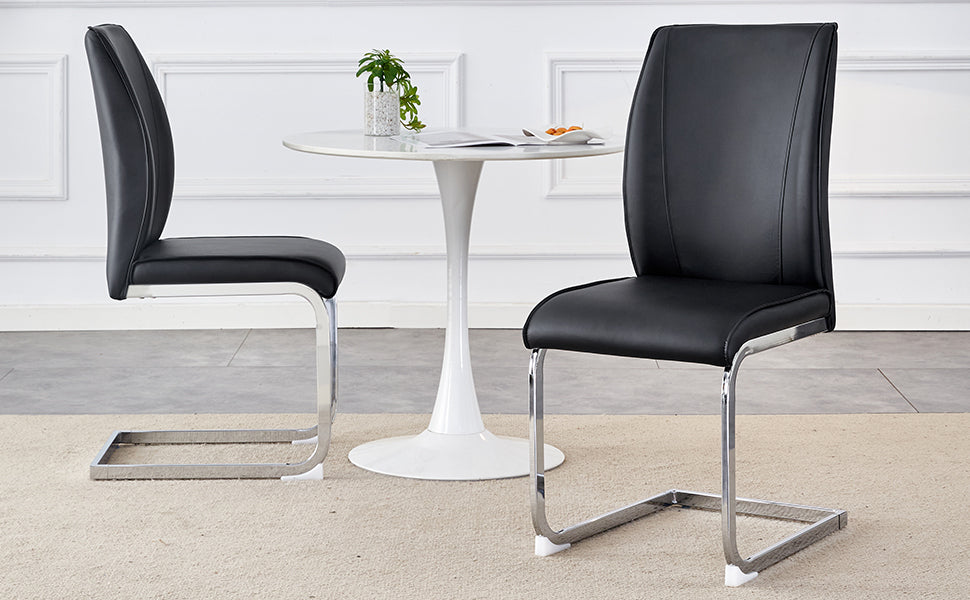 Black faux leather dining chair with polished chrome cantilever base