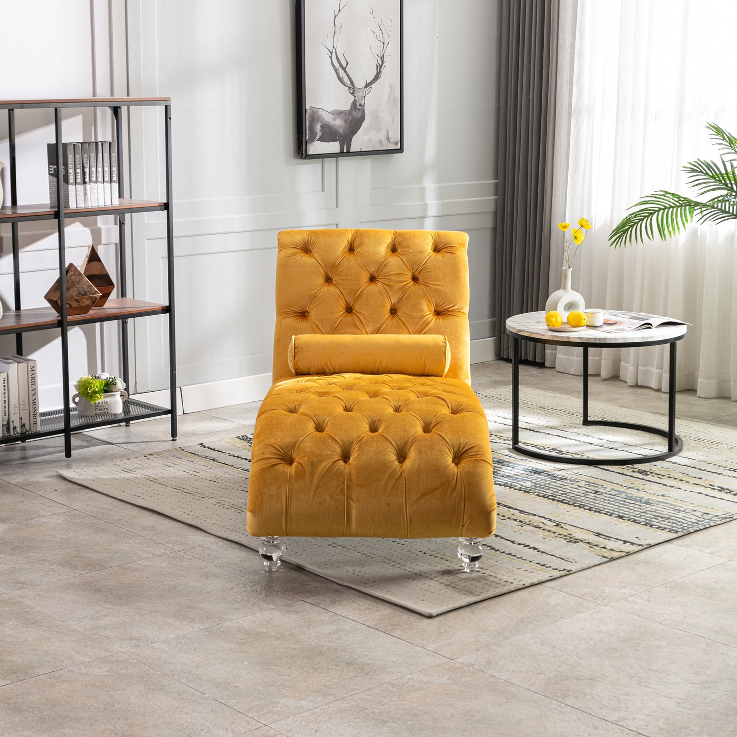 Tufted mustard velvet chaise lounge with clear acrylic legs and bolster pillow