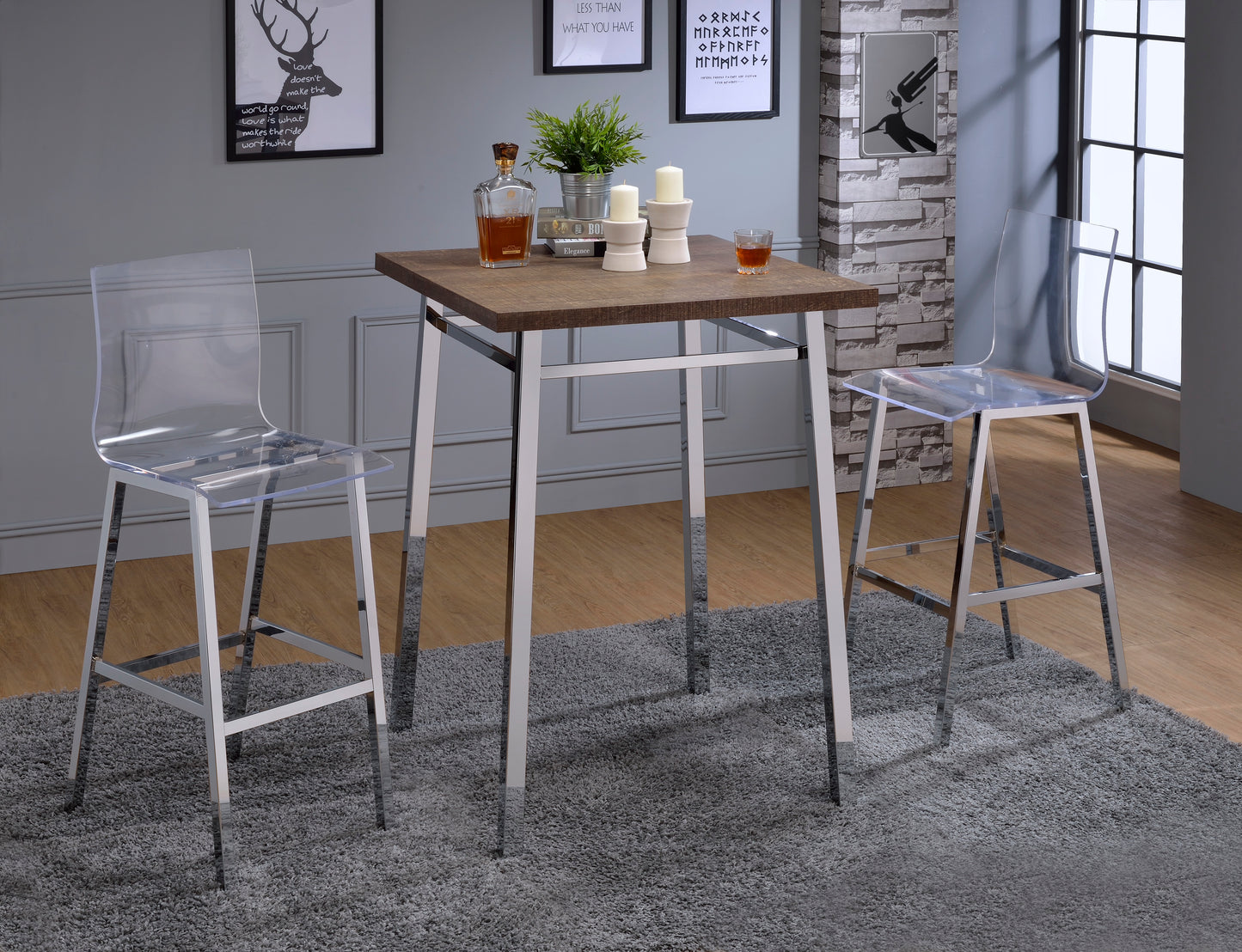 Modern square bar table with dark wood top and chrome legs paired with clear acrylic stools