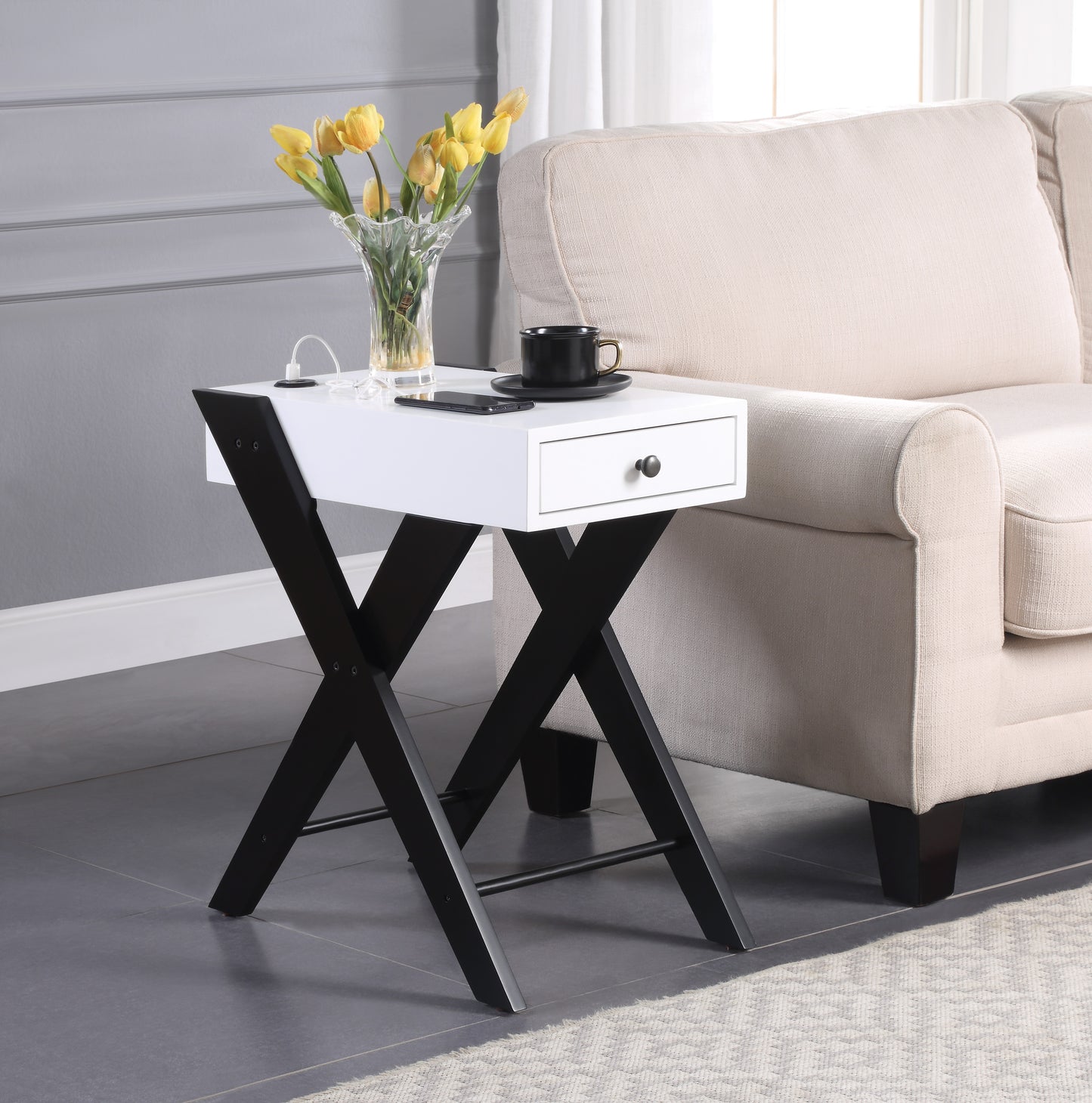 Modern white end table with black Xframe legs integrated drawer and charging port